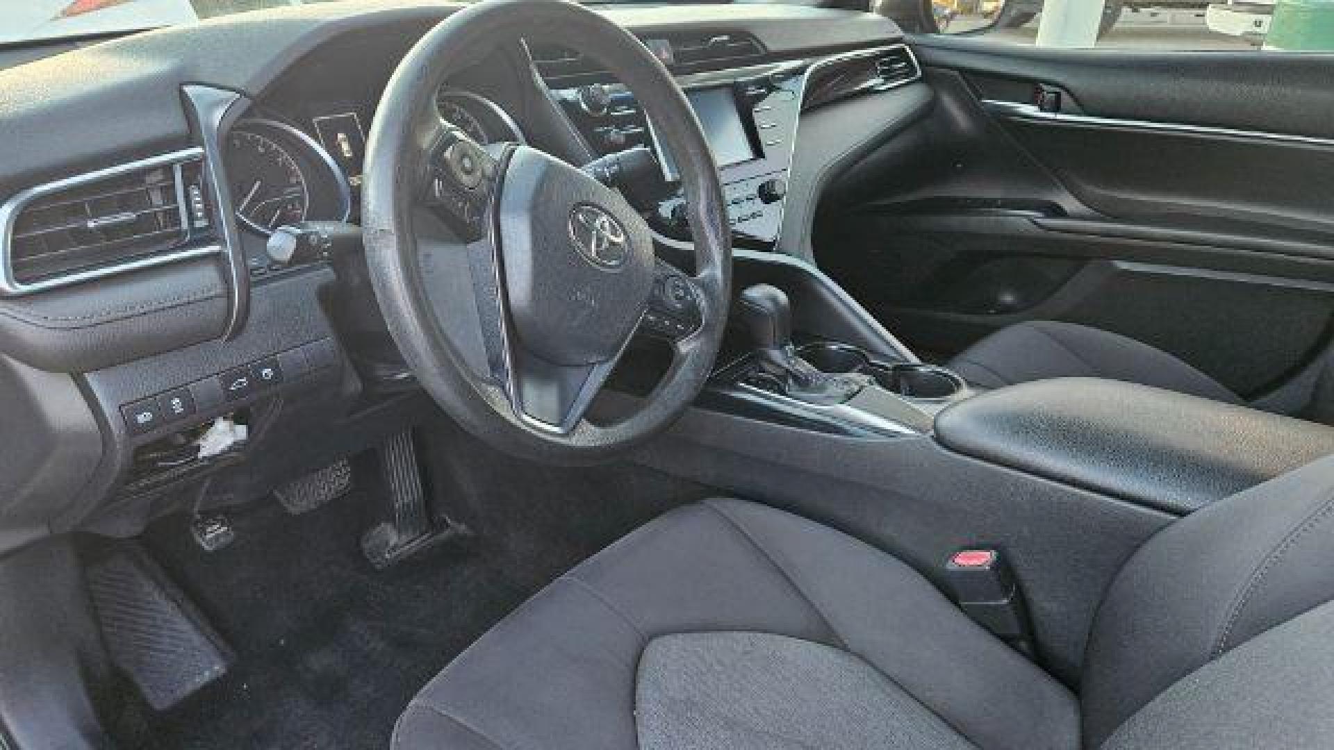 2018 Predawn Gray Mica /Ash Toyota Camry LE (4T1B11HK1JU) with an 2.5L I-4 port/direct injection engine, located at 4545 Spencer Hwy., Pasadena, 77504, (832) 266-1645, 29.666037, -95.173775 - Photo#3