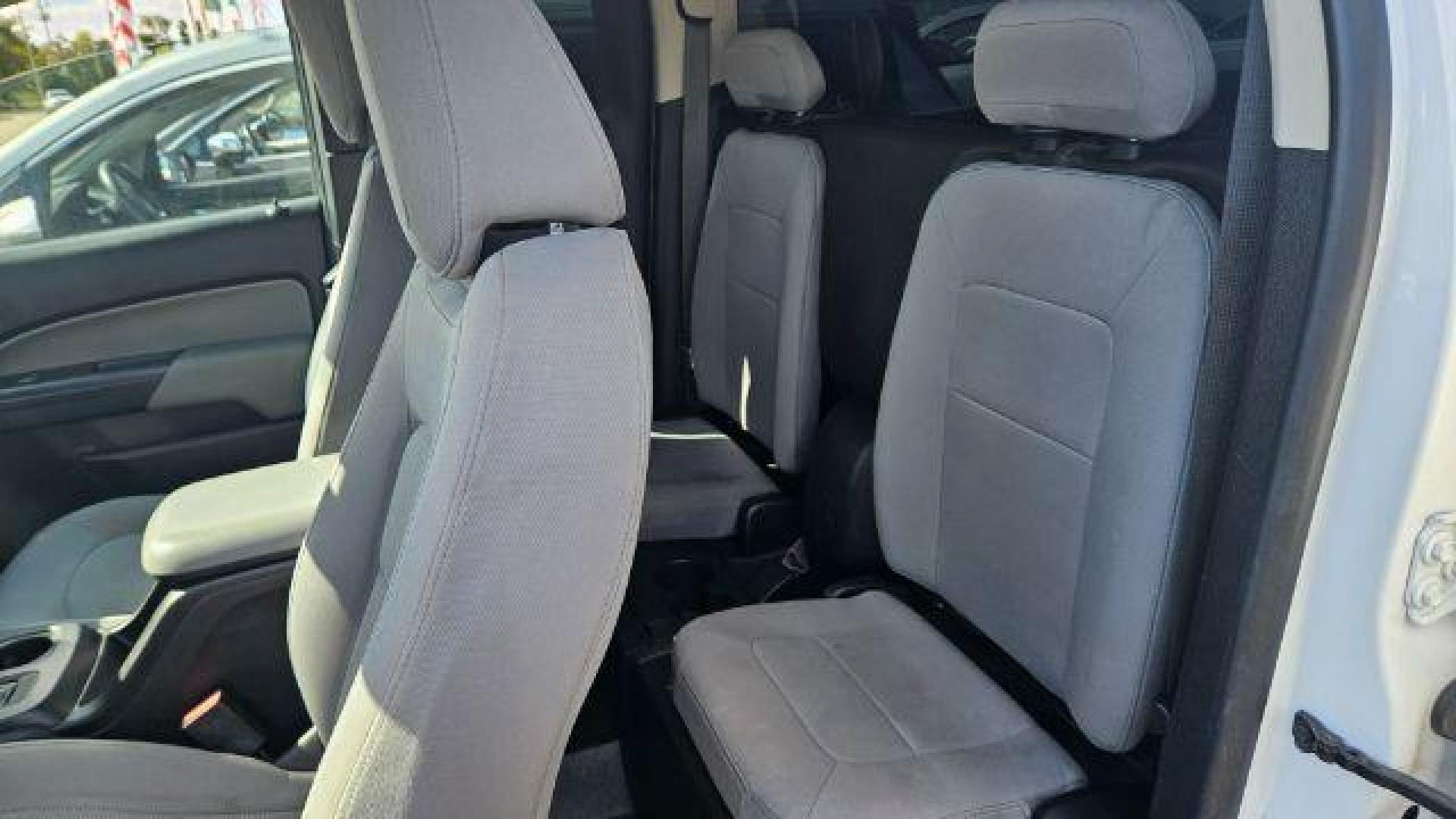 2020 Summit White Chevrolet Colorado 2WD Extended Cab Long Box LT (1GCHSCEA2L1) , located at 4545 Spencer Hwy., Pasadena, 77504, (832) 266-1645, 29.666037, -95.173775 - Photo#10