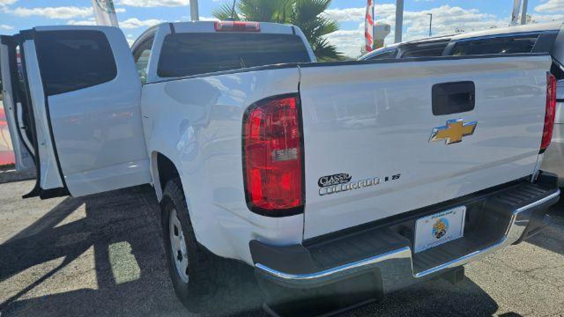 2020 Summit White Chevrolet Colorado 2WD Extended Cab Long Box LT (1GCHSCEA2L1) , located at 4545 Spencer Hwy., Pasadena, 77504, (832) 266-1645, 29.666037, -95.173775 - Photo#11
