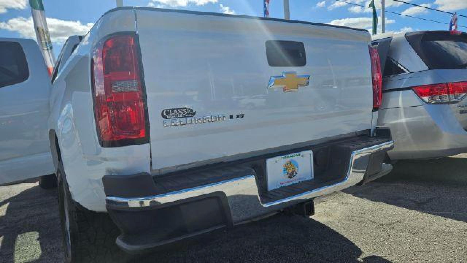 2020 Summit White Chevrolet Colorado 2WD Extended Cab Long Box LT (1GCHSCEA2L1) , located at 4545 Spencer Hwy., Pasadena, 77504, (832) 266-1645, 29.666037, -95.173775 - Photo#12