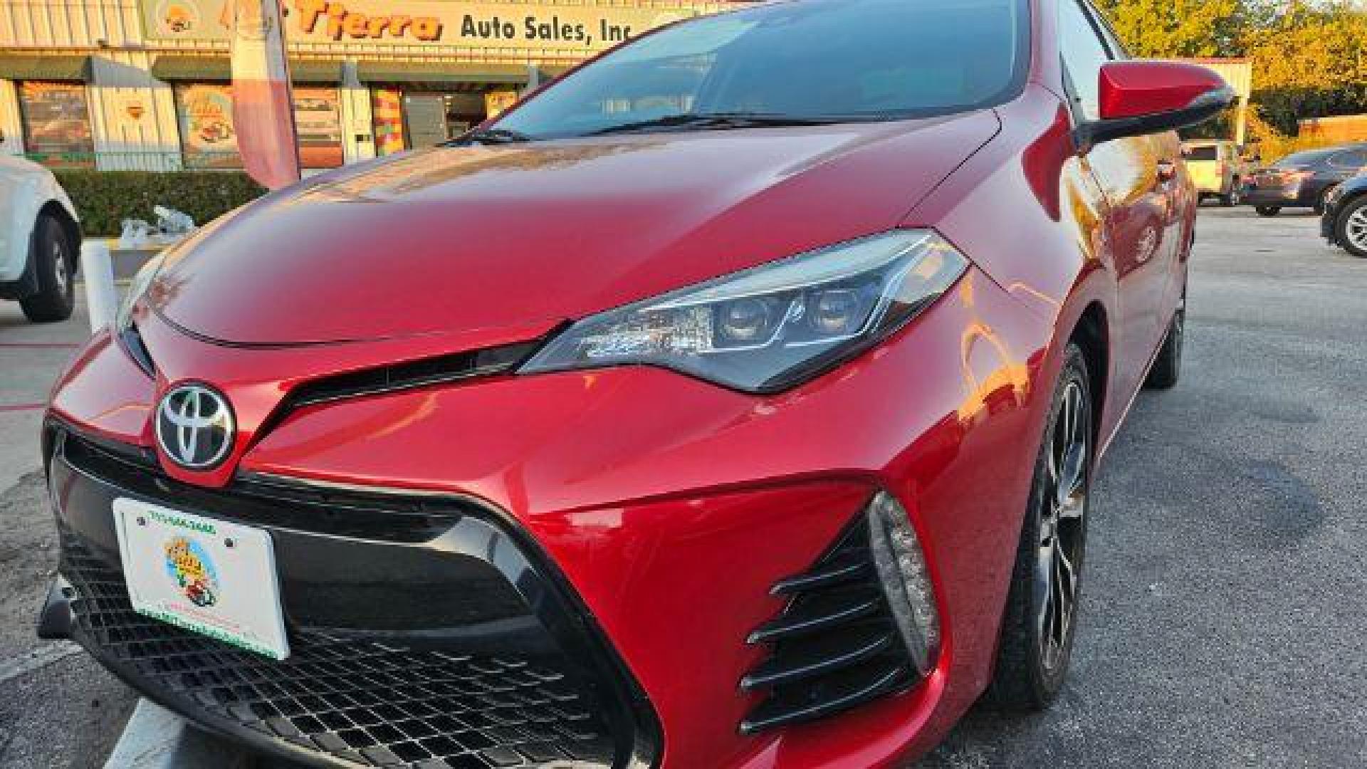 2017 Barcelona Red Metallic /Black Toyota Corolla SE (5YFBURHE4HP) with an 1.8L I-4 DOHC engine, located at 4545 Spencer Hwy., Pasadena, 77504, (832) 266-1645, 29.666037, -95.173775 - Photo#1