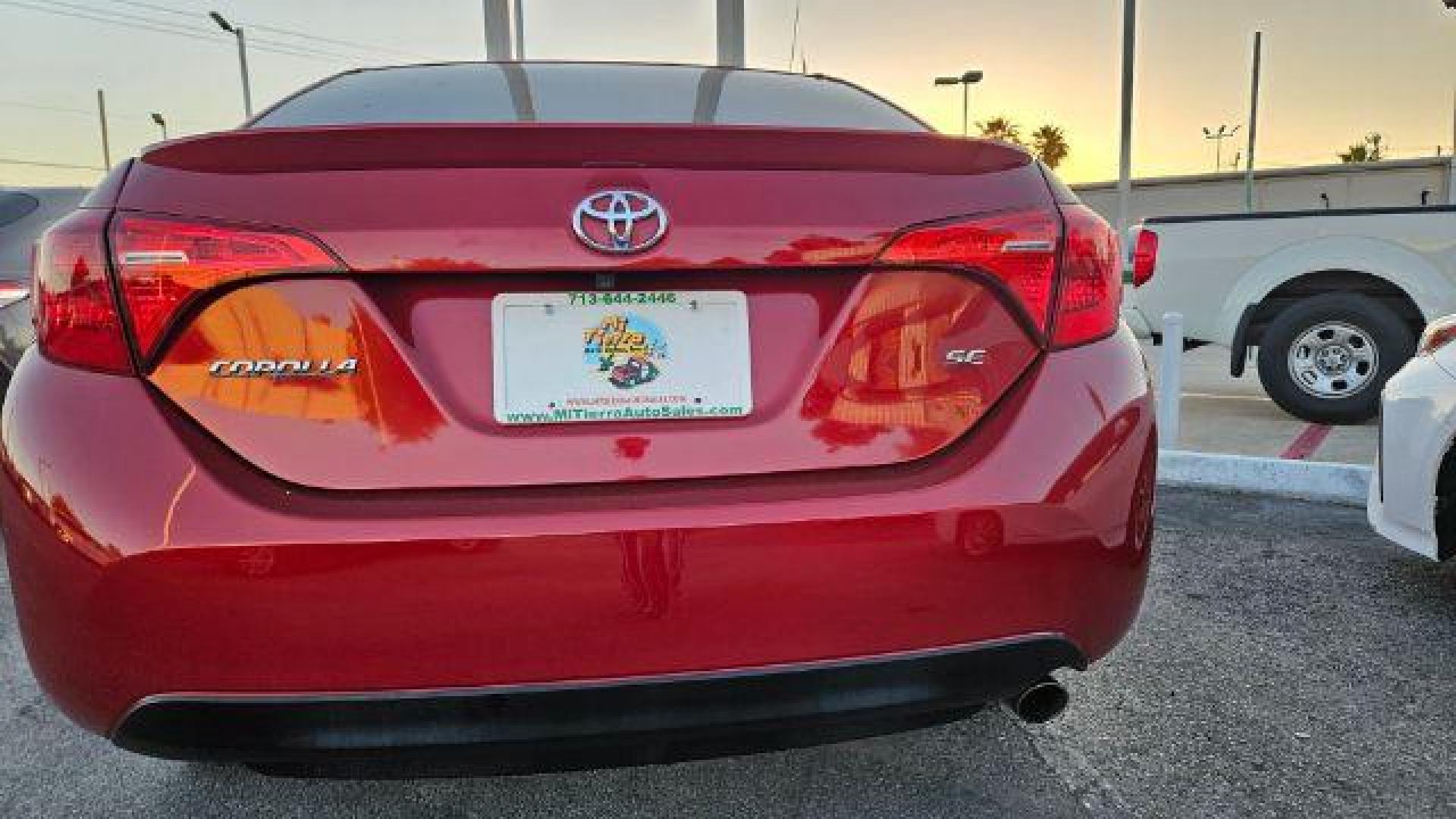 2017 Barcelona Red Metallic /Black Toyota Corolla SE (5YFBURHE4HP) with an 1.8L I-4 DOHC engine, located at 4545 Spencer Hwy., Pasadena, 77504, (832) 266-1645, 29.666037, -95.173775 - Photo#3