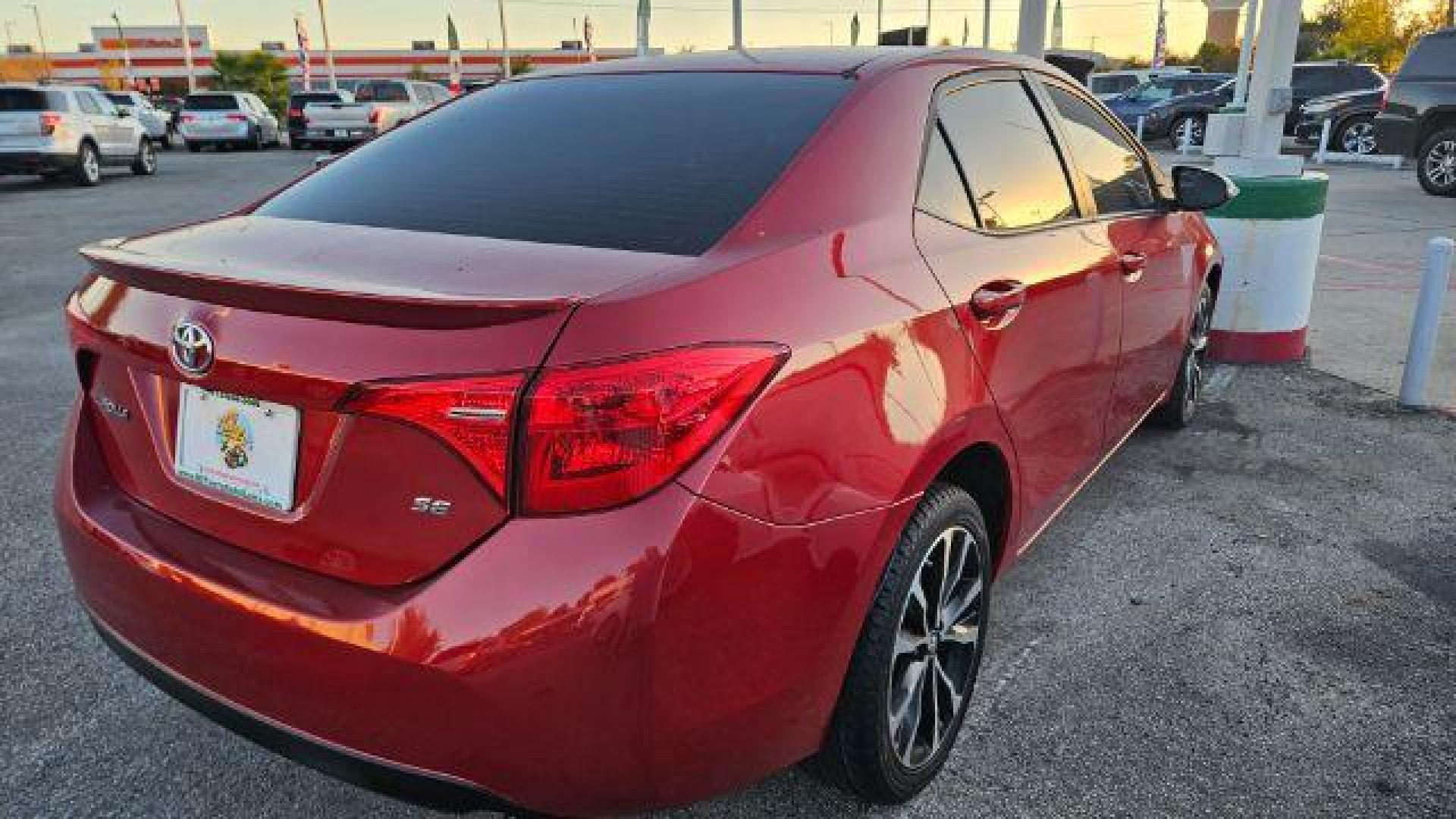 2017 Barcelona Red Metallic /Black Toyota Corolla SE (5YFBURHE4HP) with an 1.8L I-4 DOHC engine, located at 4545 Spencer Hwy., Pasadena, 77504, (832) 266-1645, 29.666037, -95.173775 - Photo#5