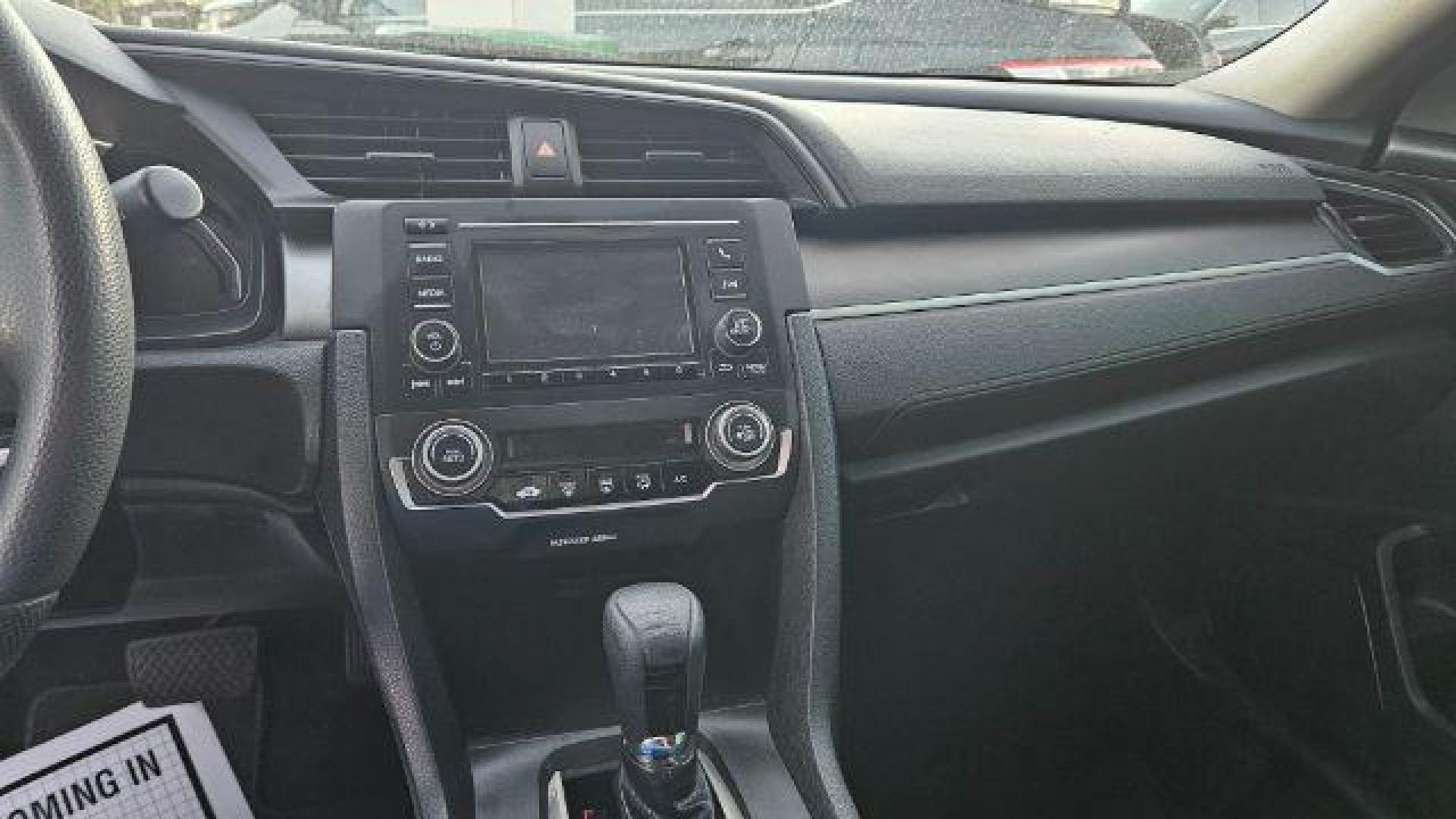 2017 Cosmic Blue Metallic /Ivory Honda Civic LX (19XFC2F51HE) with an 2L I-4 DOHC engine, located at 4545 Spencer Hwy., Pasadena, 77504, (832) 266-1645, 29.666037, -95.173775 - Photo#4