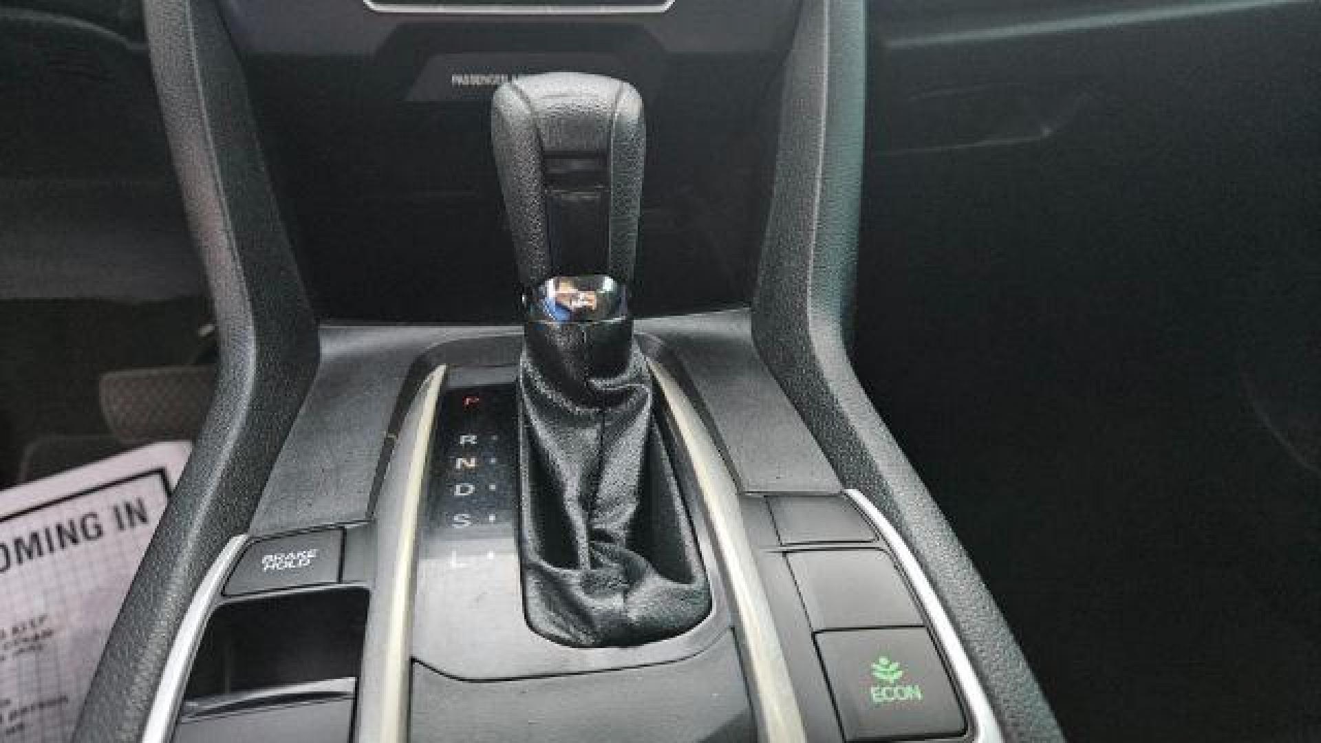 2017 Cosmic Blue Metallic /Ivory Honda Civic LX (19XFC2F51HE) with an 2L I-4 DOHC engine, located at 4545 Spencer Hwy., Pasadena, 77504, (832) 266-1645, 29.666037, -95.173775 - Photo#5