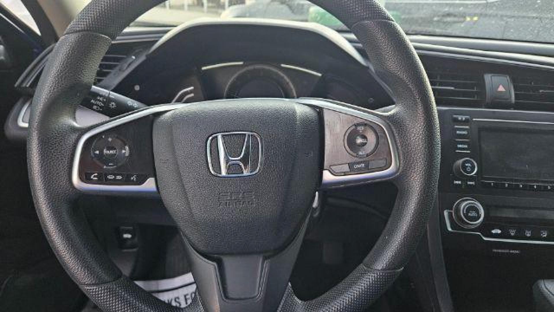 2017 Cosmic Blue Metallic /Ivory Honda Civic LX (19XFC2F51HE) with an 2L I-4 DOHC engine, located at 4545 Spencer Hwy., Pasadena, 77504, (832) 266-1645, 29.666037, -95.173775 - Photo#6