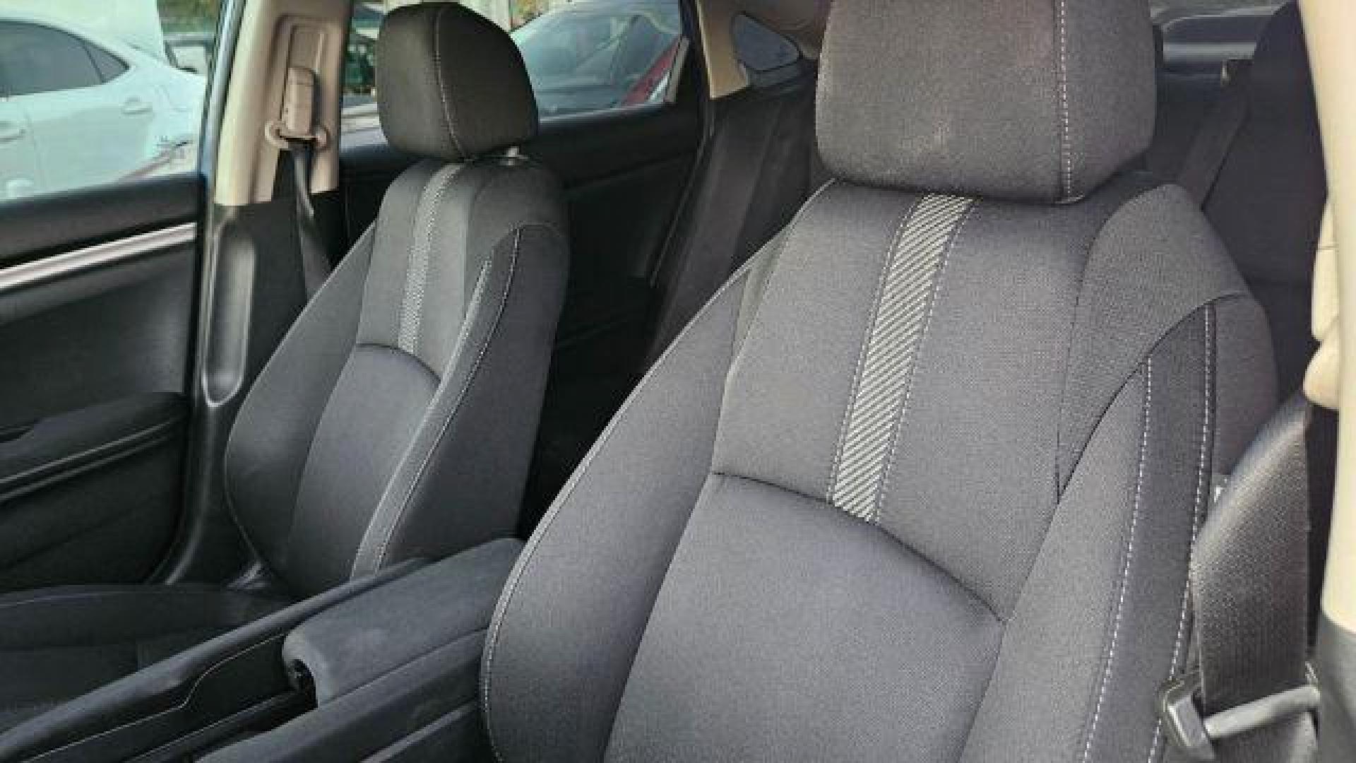 2017 Cosmic Blue Metallic /Ivory Honda Civic LX (19XFC2F51HE) with an 2L I-4 DOHC engine, located at 4545 Spencer Hwy., Pasadena, 77504, (832) 266-1645, 29.666037, -95.173775 - Photo#9