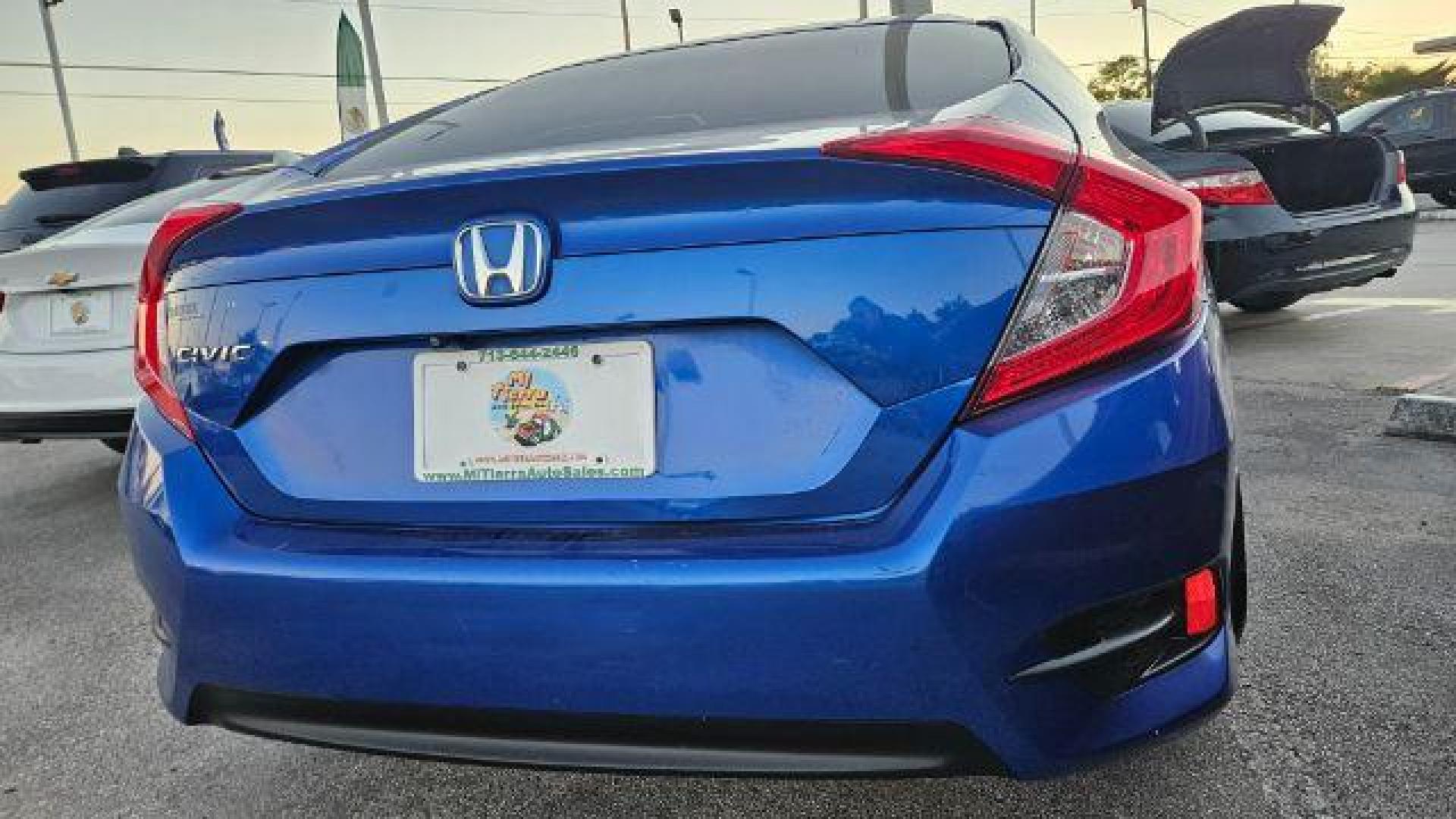 2017 Cosmic Blue Metallic /Ivory Honda Civic LX (19XFC2F51HE) with an 2L I-4 DOHC engine, located at 4545 Spencer Hwy., Pasadena, 77504, (832) 266-1645, 29.666037, -95.173775 - Photo#11