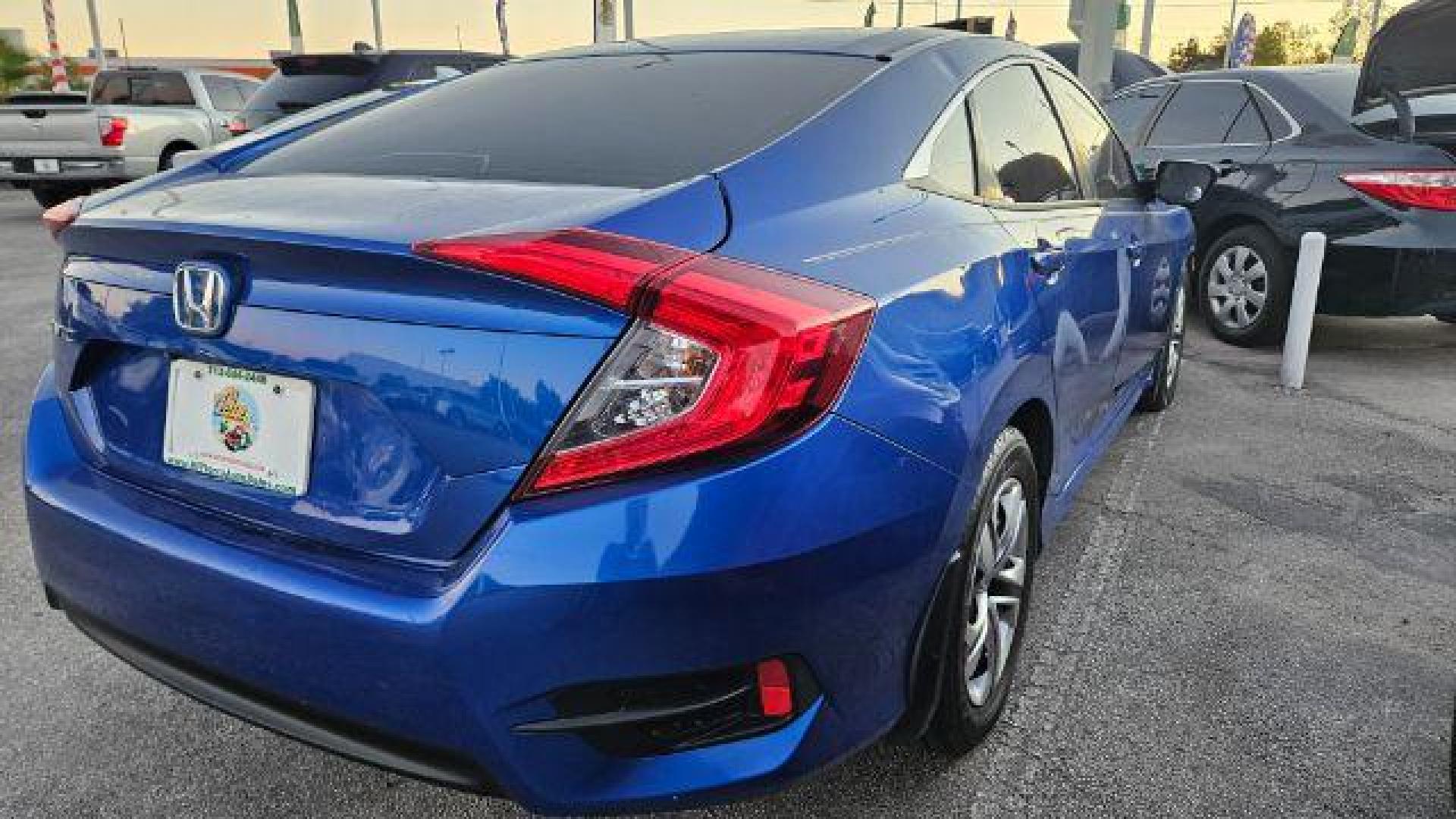2017 Cosmic Blue Metallic /Ivory Honda Civic LX (19XFC2F51HE) with an 2L I-4 DOHC engine, located at 4545 Spencer Hwy., Pasadena, 77504, (832) 266-1645, 29.666037, -95.173775 - Photo#12