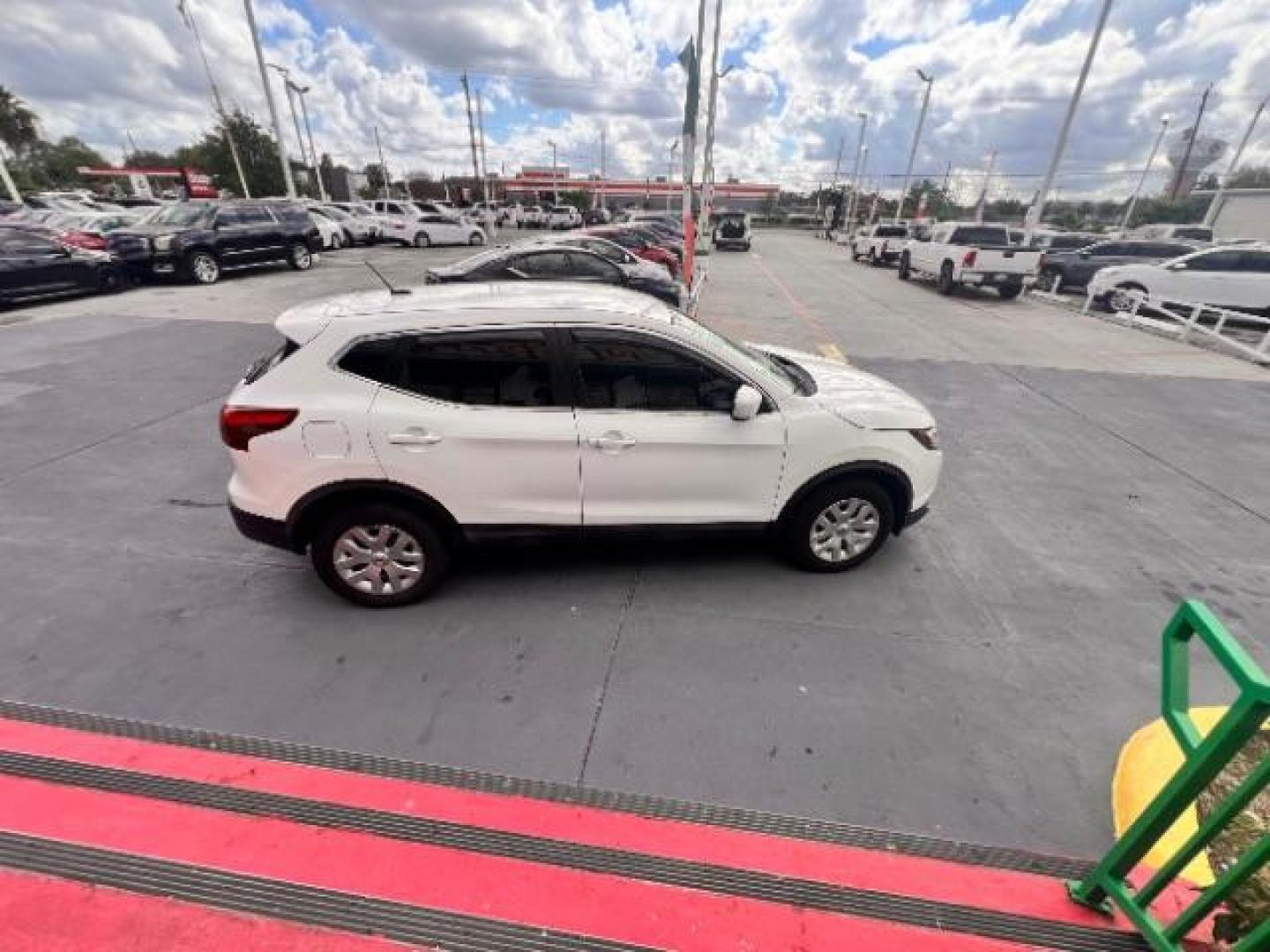 2019 Glacier White /Charcoal Nissan Rogue Sport S (JN1BJ1CP3KW) with an 2L I-4 gasoline direct injection engine, located at 4545 Spencer Hwy., Pasadena, 77504, (832) 266-1645, 29.666037, -95.173775 - Photo#3