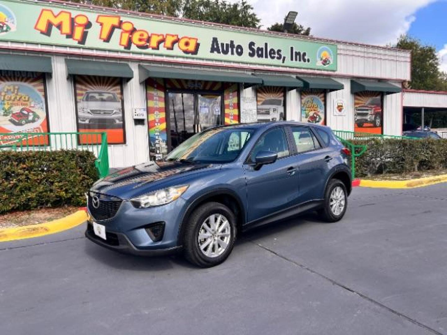 2014 Deep Crystal Blue Mica /Black Mazda CX-5 Sport (JM3KE2BE6E0) with an SKYACTIV-G 2L I-4 gasoline direct injection engine, located at 4545 Spencer Hwy., Pasadena, 77504, (832) 266-1645, 29.666037, -95.173775 - Photo#0