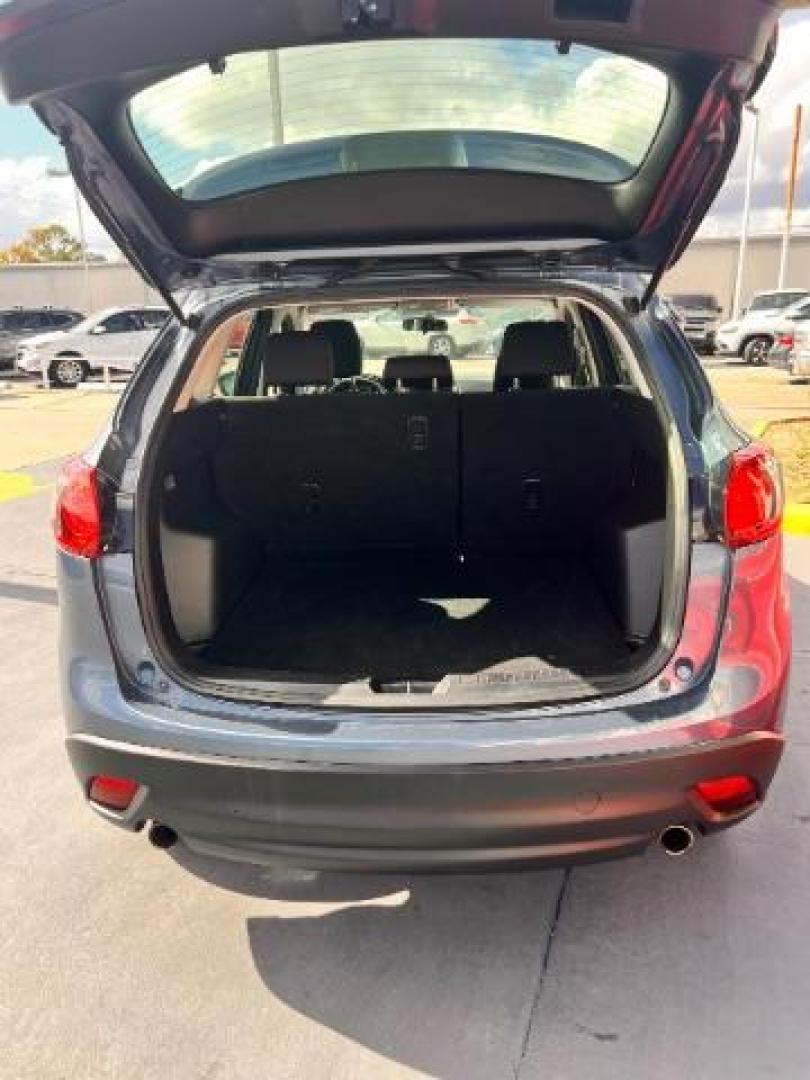 2014 Deep Crystal Blue Mica /Black Mazda CX-5 Sport (JM3KE2BE6E0) with an SKYACTIV-G 2L I-4 gasoline direct injection engine, located at 4545 Spencer Hwy., Pasadena, 77504, (832) 266-1645, 29.666037, -95.173775 - Photo#7