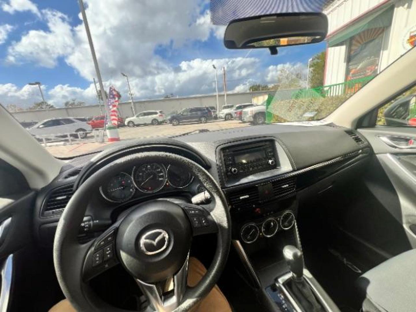 2014 Deep Crystal Blue Mica /Black Mazda CX-5 Sport (JM3KE2BE6E0) with an SKYACTIV-G 2L I-4 gasoline direct injection engine, located at 4545 Spencer Hwy., Pasadena, 77504, (832) 266-1645, 29.666037, -95.173775 - Photo#13