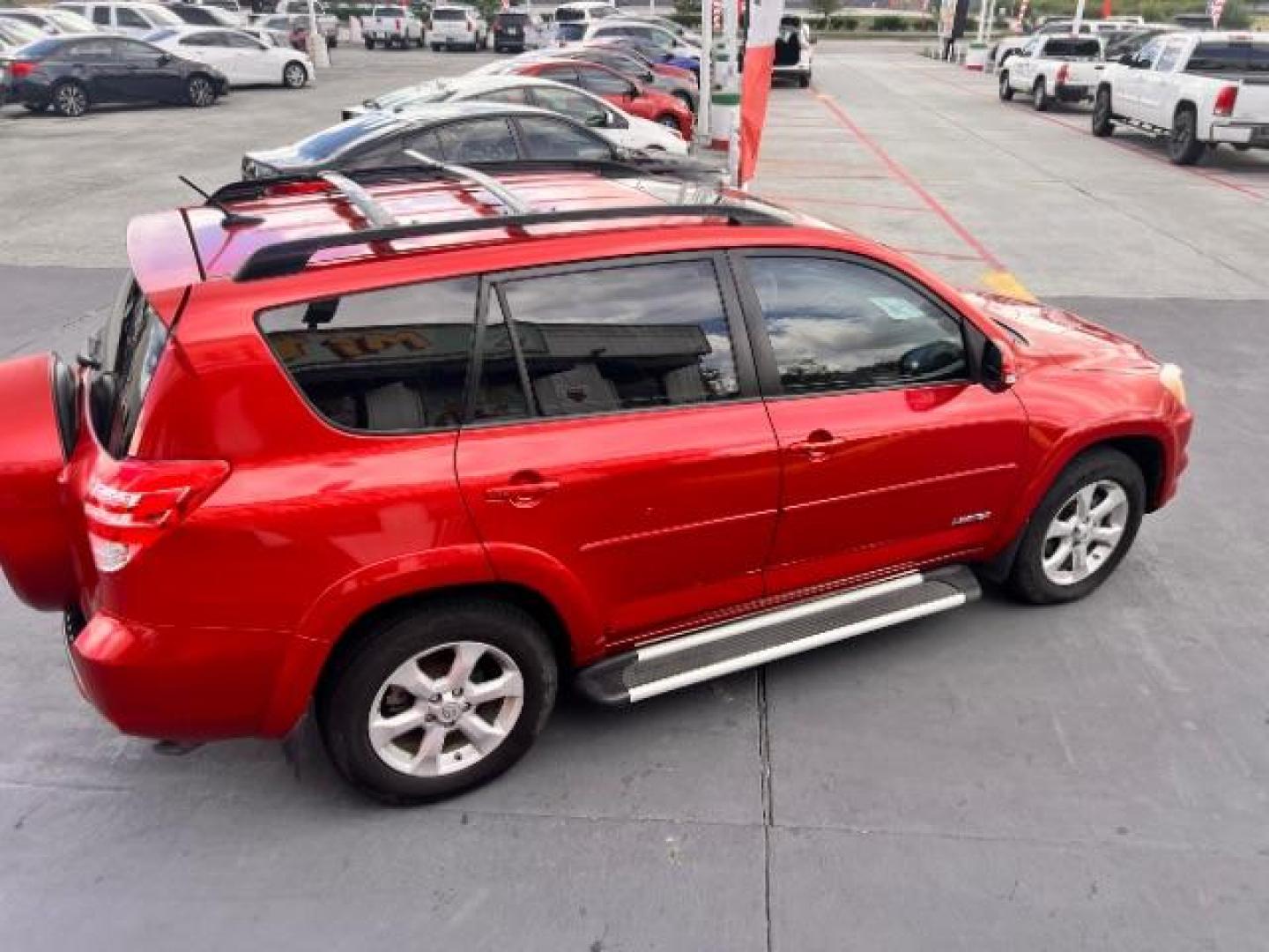 2009 Barcelona Red Metallic /Sand Beige Toyota RAV4 Limited V6 (JTMZK31V59D) with an 3.5L V-6 DOHC engine, located at 4545 Spencer Hwy., Pasadena, 77504, (832) 266-1645, 29.666037, -95.173775 - Photo#4