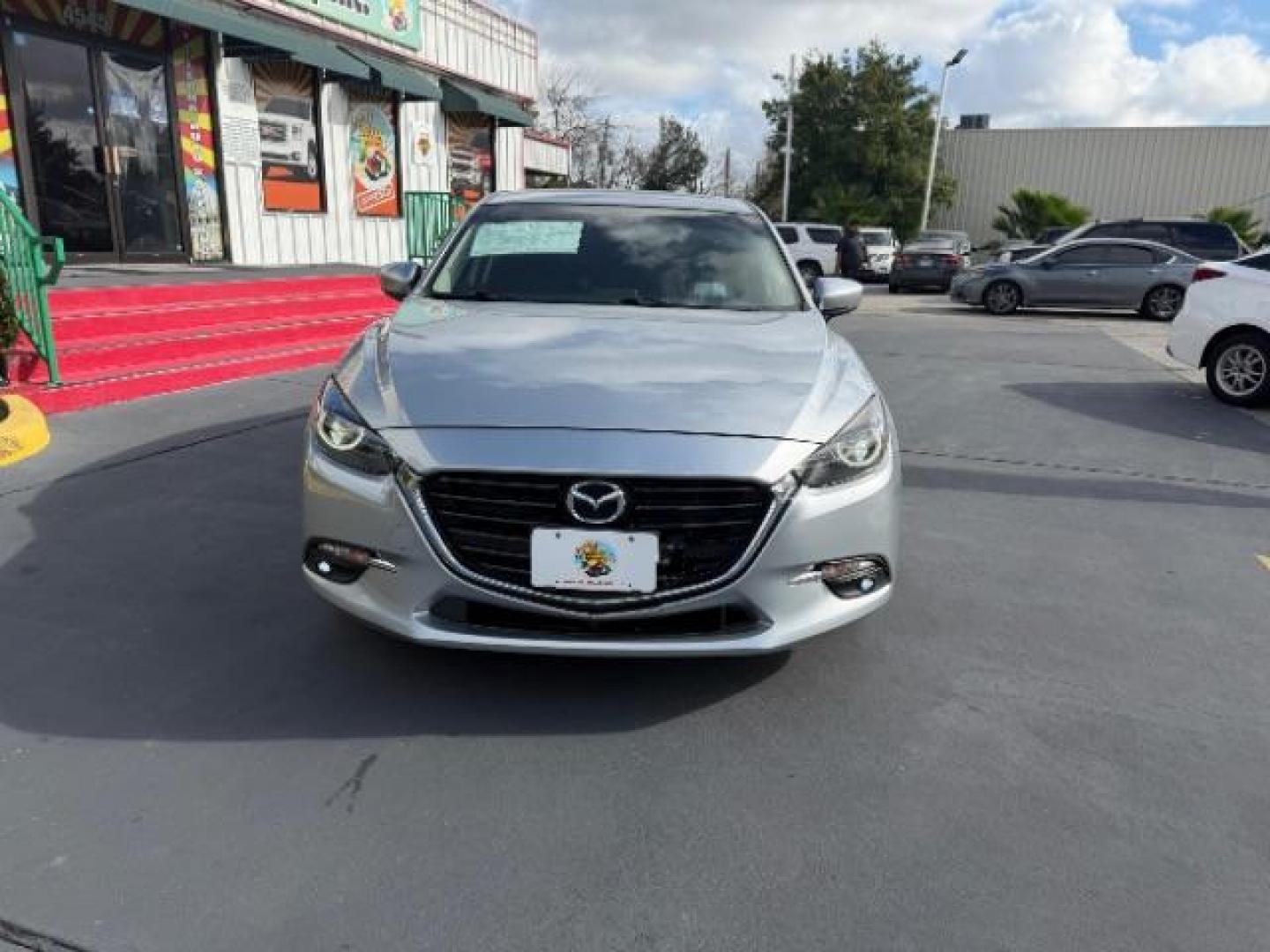 2017 Sonic Silver Metallic /Black Mazda Mazda3 Grand Touring (JM1BN1W32H1) with an SKYACTIV-G 2.5L I-4 gasoline direct injection engine, located at 4545 Spencer Hwy., Pasadena, 77504, (832) 266-1645, 29.666037, -95.173775 - Photo#1