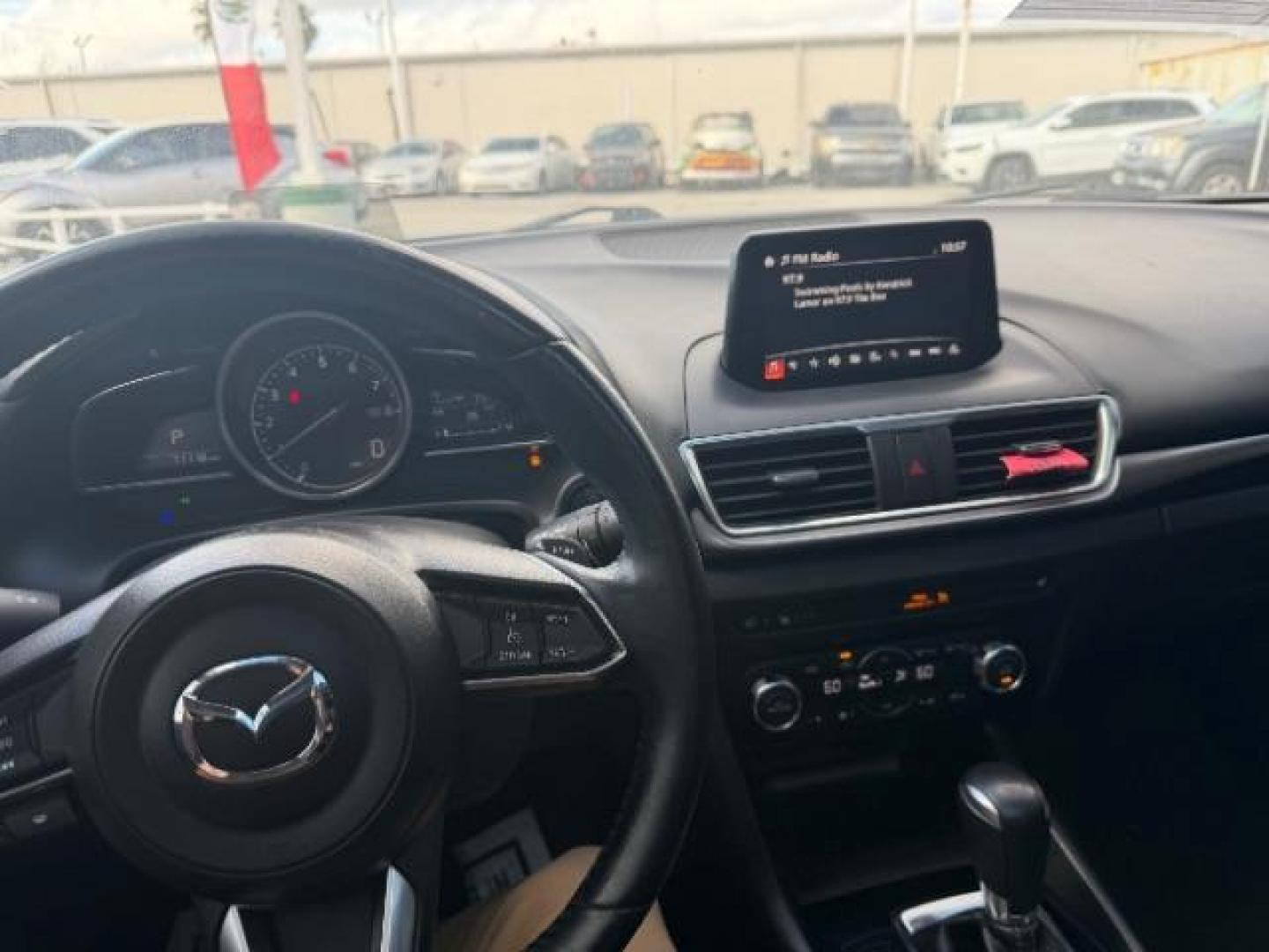 2017 Sonic Silver Metallic /Black Mazda Mazda3 Grand Touring (JM1BN1W32H1) with an SKYACTIV-G 2.5L I-4 gasoline direct injection engine, located at 4545 Spencer Hwy., Pasadena, 77504, (832) 266-1645, 29.666037, -95.173775 - Photo#9