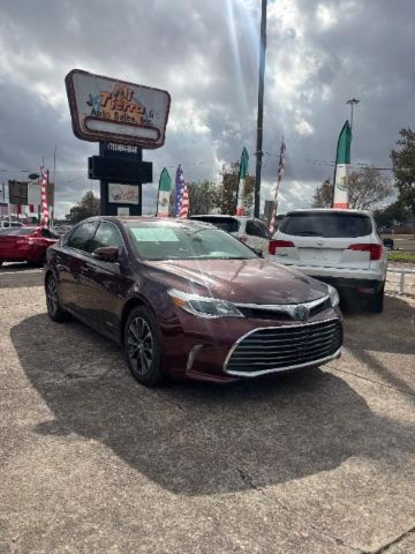 2018 Ooh La La Rouge Mica Toyota Avalon Hybrid XLE Premium (4T1BD1EB6JU) with an 2.5L I-4 DOHC engine, located at 7935 Gulf Freeway, Houston, 77017, (832) 266-1645, 29.684393, -95.275665 - Photo#0