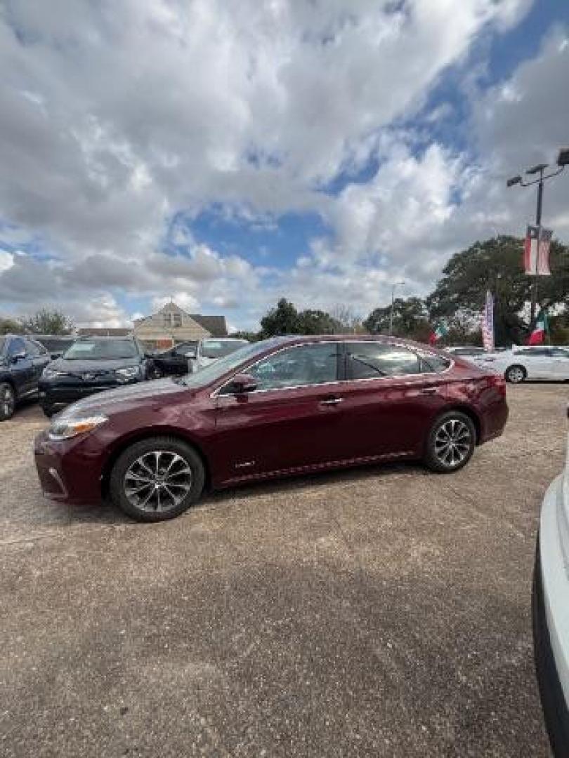 2018 Ooh La La Rouge Mica Toyota Avalon Hybrid XLE Premium (4T1BD1EB6JU) with an 2.5L I-4 DOHC engine, located at 7935 Gulf Freeway, Houston, 77017, (832) 266-1645, 29.684393, -95.275665 - Photo#3