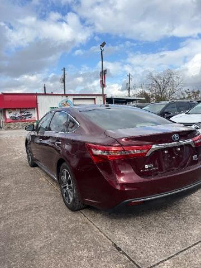 2018 Ooh La La Rouge Mica Toyota Avalon Hybrid XLE Premium (4T1BD1EB6JU) with an 2.5L I-4 DOHC engine, located at 7935 Gulf Freeway, Houston, 77017, (832) 266-1645, 29.684393, -95.275665 - Photo#4