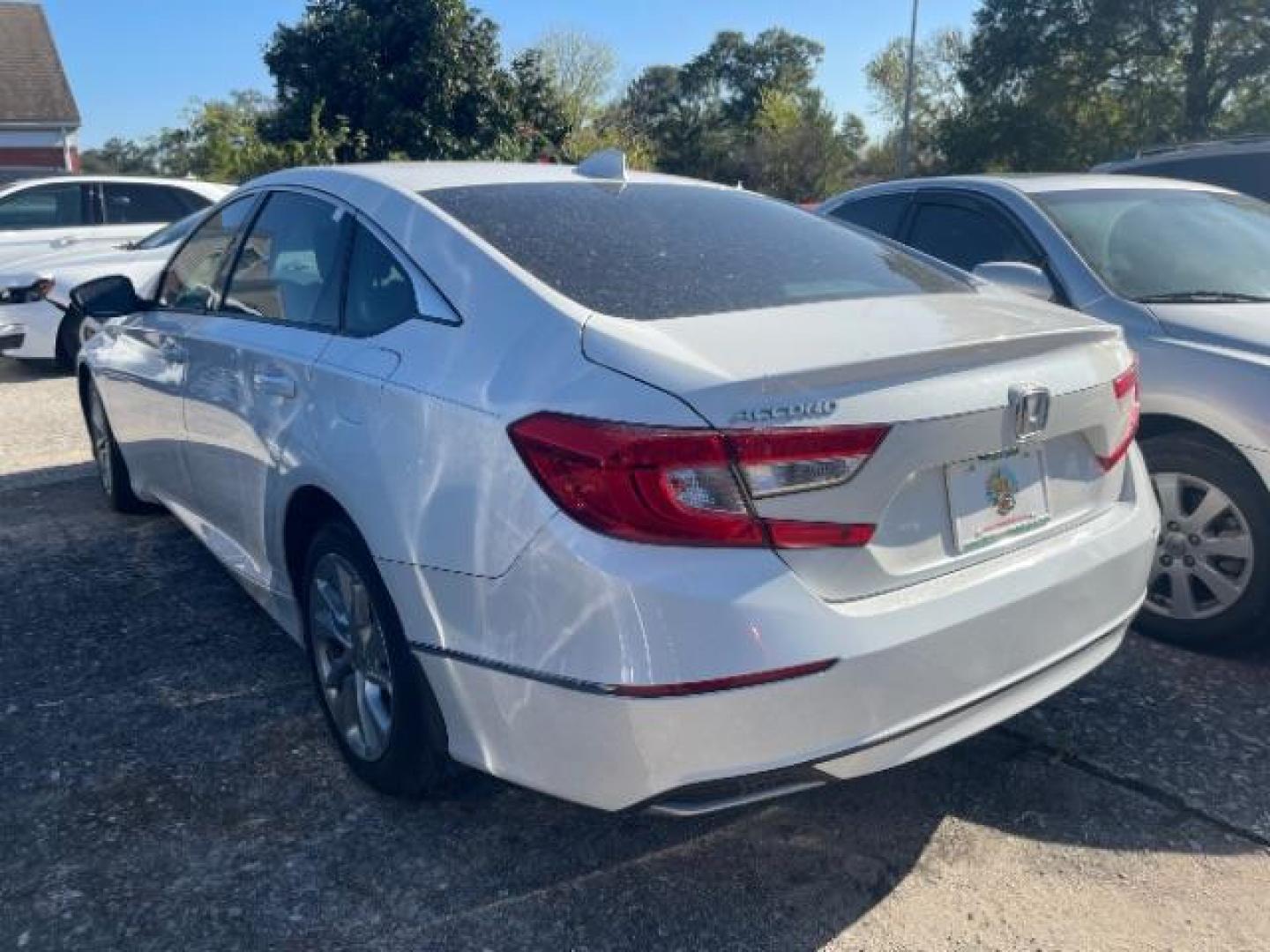2018 Platinum White Pearl Honda Accord LX (1HGCV1F18JA) with an 1.5L I-4 gasoline direct injection engine, located at 7935 Gulf Freeway, Houston, 77017, (832) 266-1645, 29.684393, -95.275665 - Photo#2