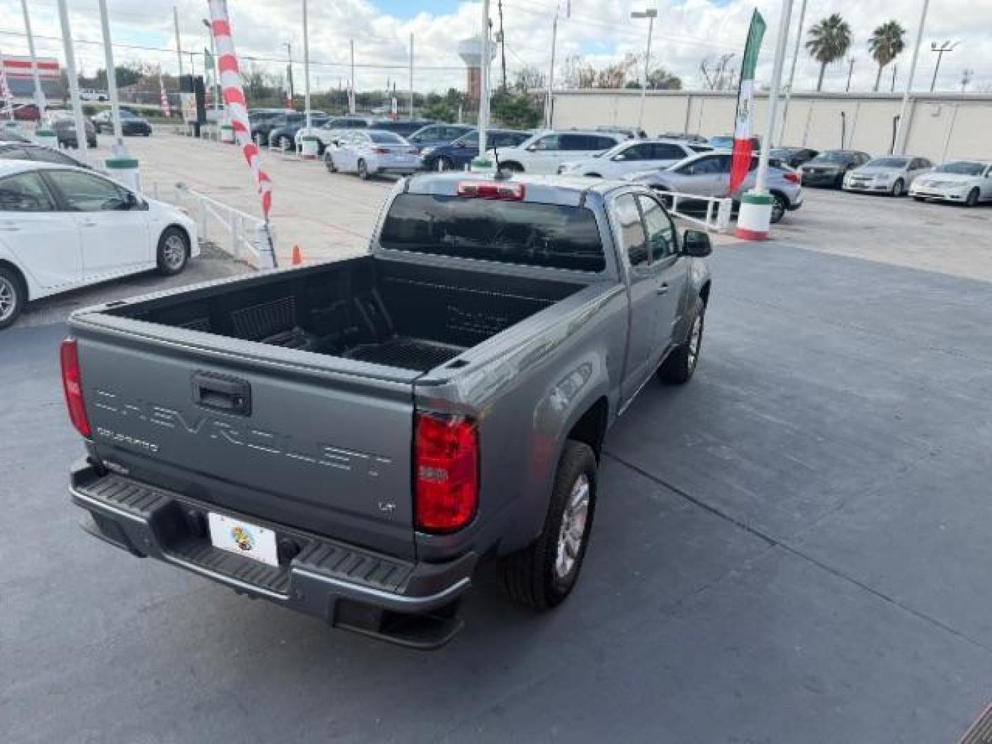 2021 Satin Steel Metallic /Jet Black Chevrolet Colorado 2WD Extended Cab Long Box LT (1GCHSCEA8M1) , located at 4545 Spencer Hwy., Pasadena, 77504, (832) 266-1645, 29.666037, -95.173775 - Photo#4