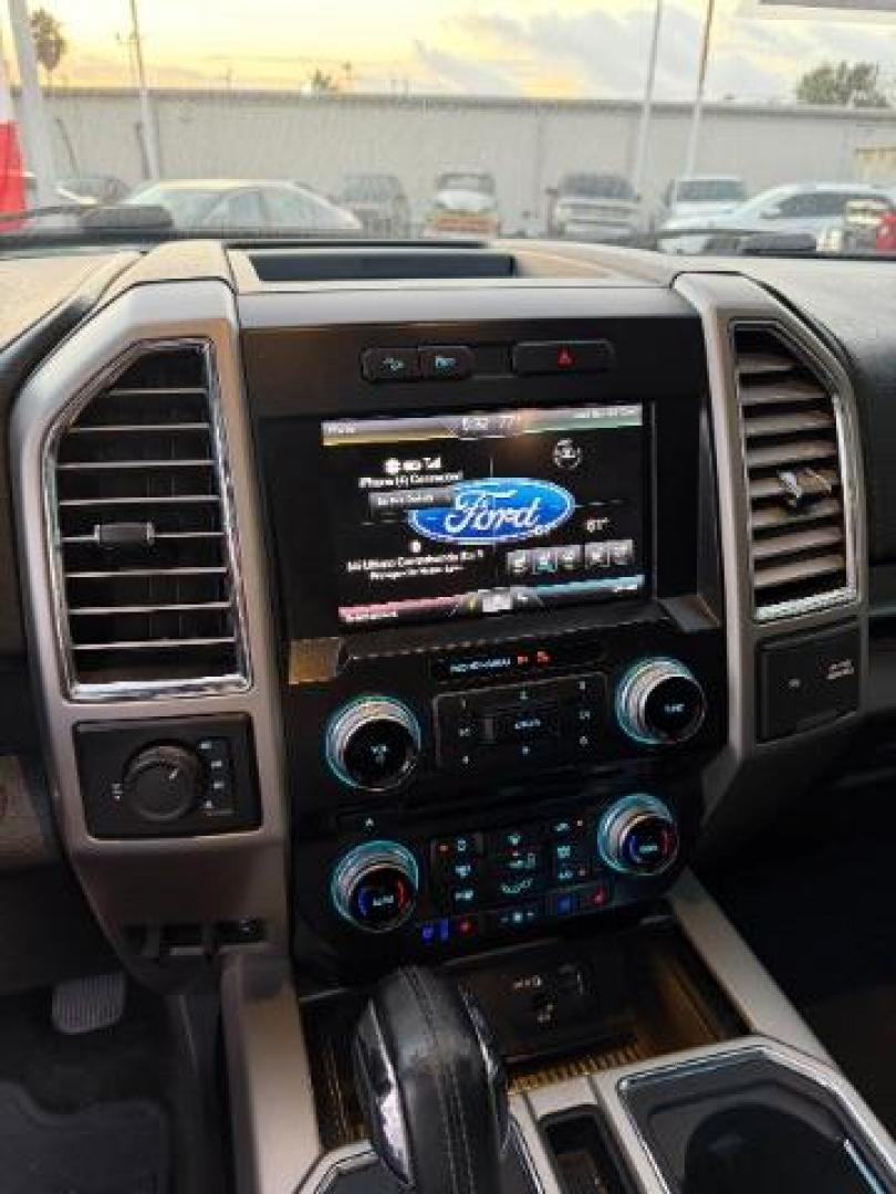 2015 Ruby Red Metallic Tinted Clearcoat /Black Ford F-150 LARIAT (1FTEW1EG5FF) , located at 4545 Spencer Hwy., Pasadena, 77504, (832) 266-1645, 29.666037, -95.173775 - Photo#23