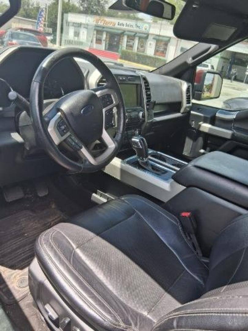 2015 Ruby Red Metallic Ti /Black Ford F-150 LARIAT (1FTEW1EG5FF) , located at 4545 Spencer Hwy., Pasadena, 77504, (832) 266-1645, 29.666037, -95.173775- Photo#1