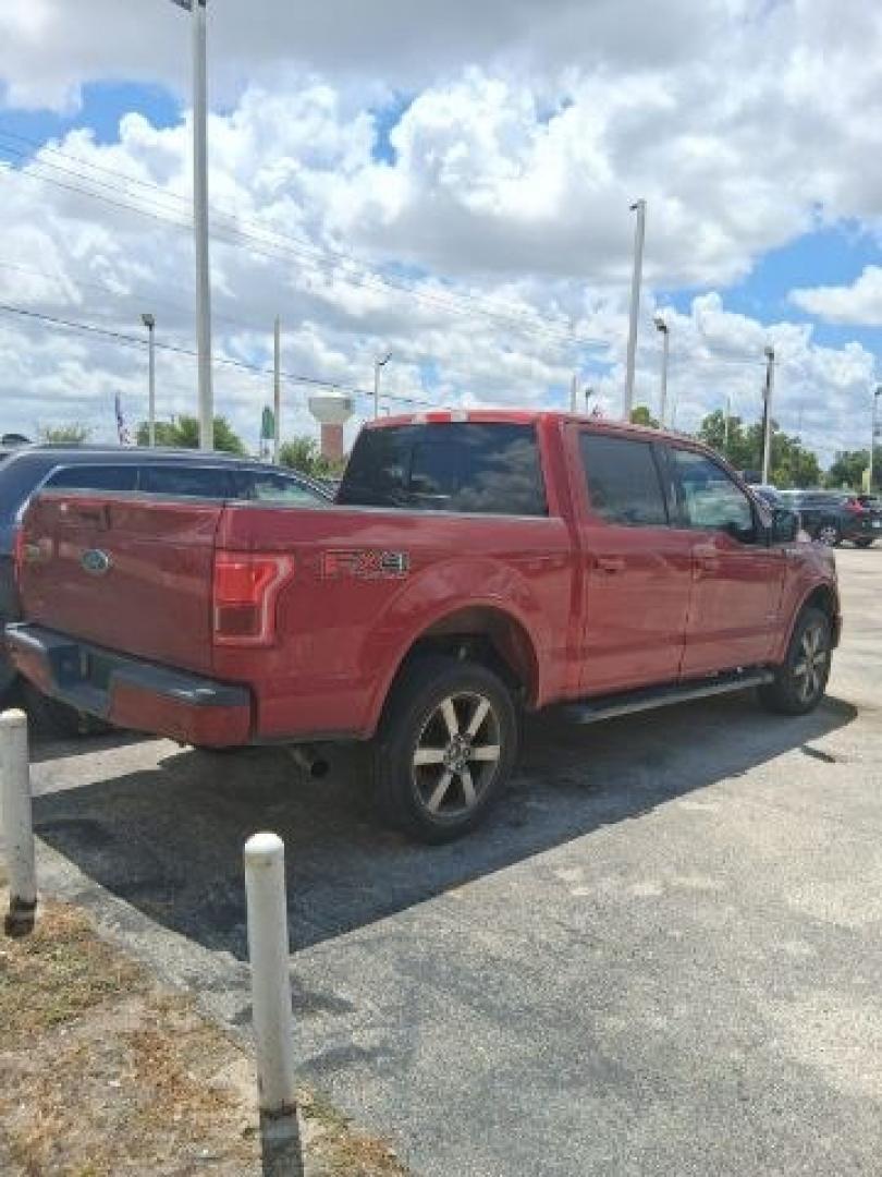 2015 Ruby Red Metallic Ti /Black Ford F-150 LARIAT (1FTEW1EG5FF) , located at 4545 Spencer Hwy., Pasadena, 77504, (832) 266-1645, 29.666037, -95.173775- Photo#2
