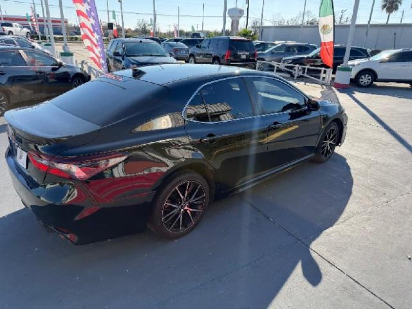 2022 Midnight Black Metallic /Black Toyota Camry SE | SE Nightshade Edition (4T1G11AKXNU) with an 2.5L I-4 port/direct injection engine, located at 4545 Spencer Hwy., Pasadena, 77504, (832) 266-1645, 29.666037, -95.173775 - Photo#2