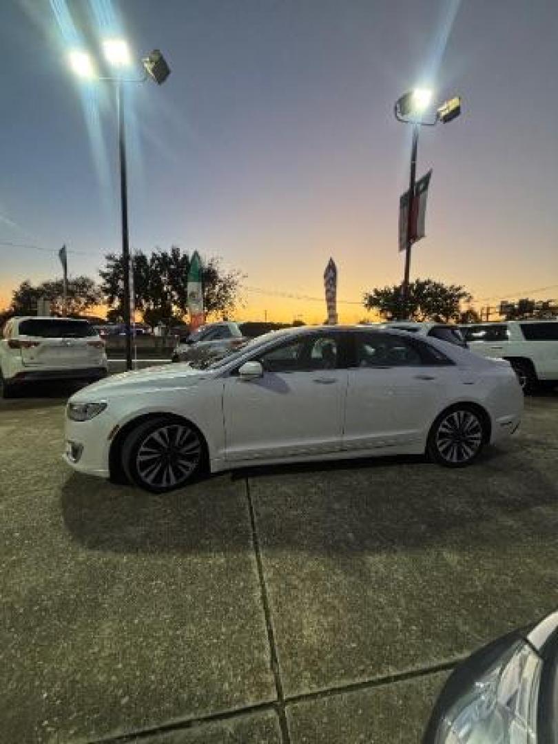 2017 White Platinum Metallic Tri-Coat Lincoln MKZ Reserve (3LN6L5E97HR) , located at 7935 Gulf Freeway, Houston, 77017, (832) 266-1645, 29.684393, -95.275665 - Photo#3