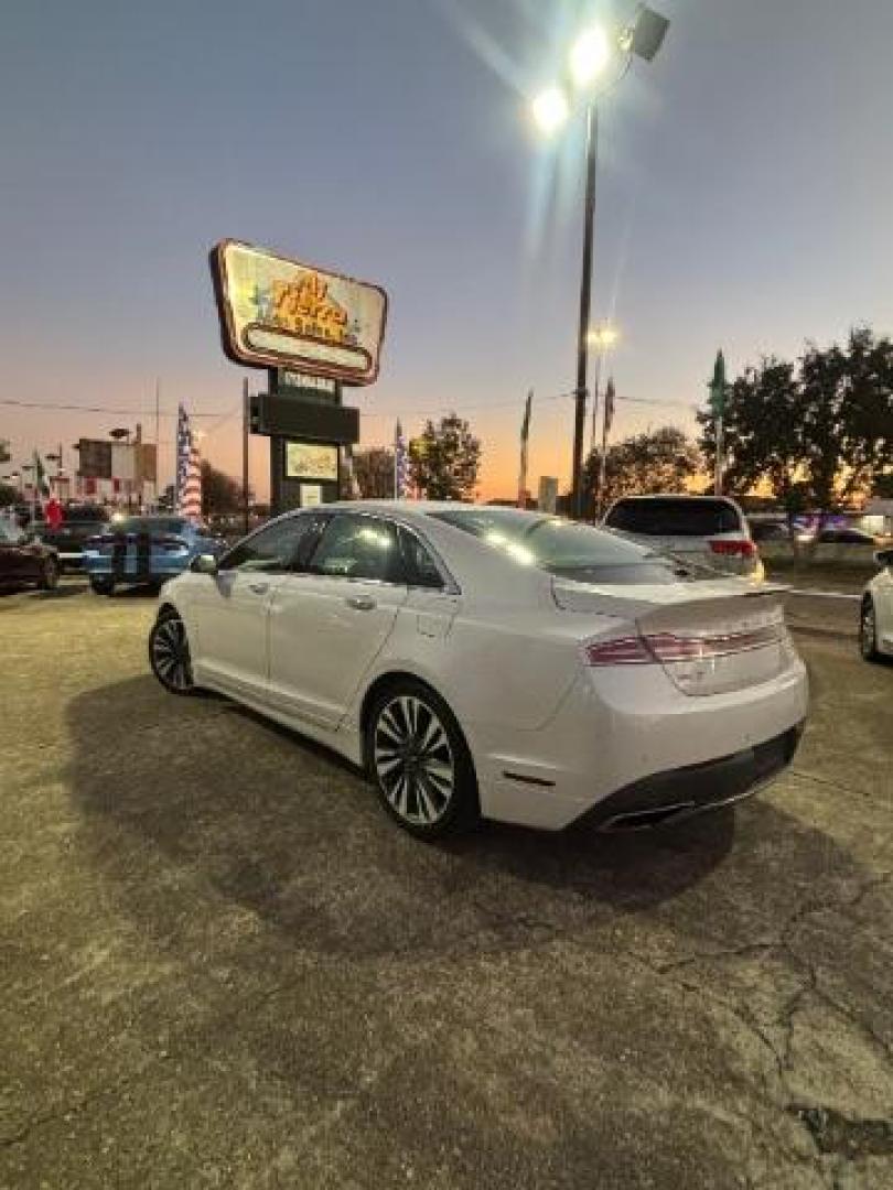 2017 White Platinum Metallic Tri-Coat Lincoln MKZ Reserve (3LN6L5E97HR) , located at 7935 Gulf Freeway, Houston, 77017, (832) 266-1645, 29.684393, -95.275665 - Photo#4
