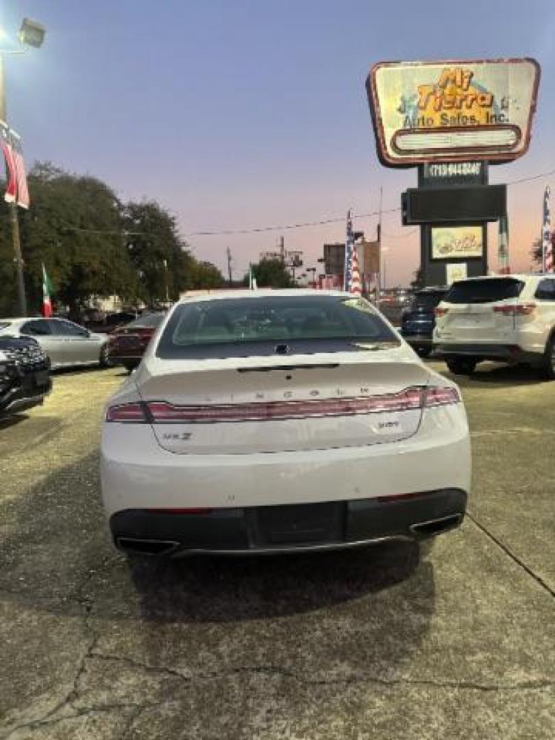 2017 White Platinum Metallic Tri-Coat Lincoln MKZ Reserve (3LN6L5E97HR) , located at 7935 Gulf Freeway, Houston, 77017, (832) 266-1645, 29.684393, -95.275665 - Photo#5