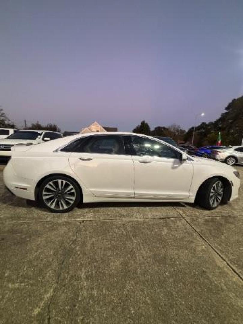 2017 White Platinum Metallic Tri-Coat Lincoln MKZ Reserve (3LN6L5E97HR) , located at 7935 Gulf Freeway, Houston, 77017, (832) 266-1645, 29.684393, -95.275665 - Photo#7