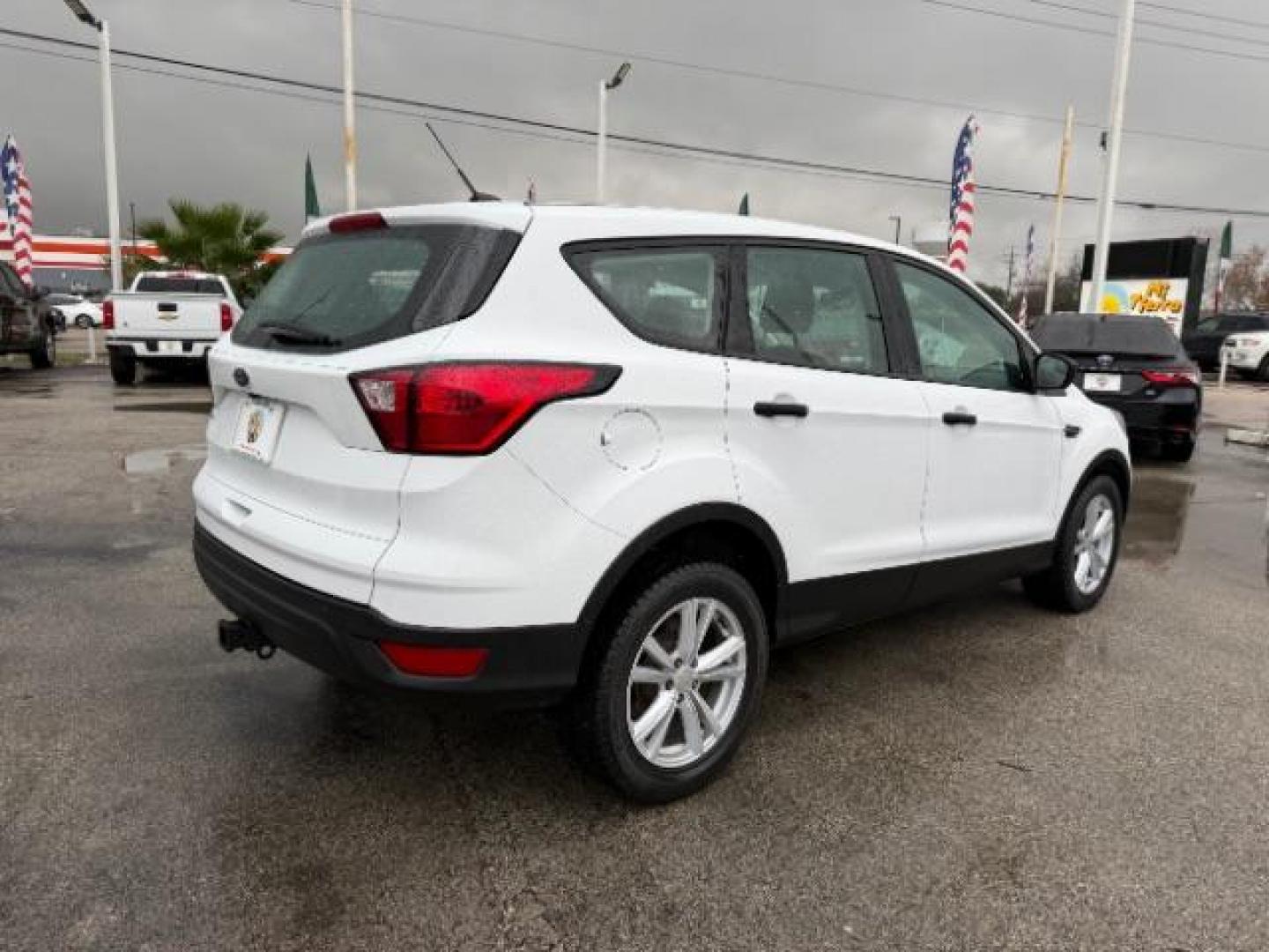 2019 Oxford White /Chromite Gray/Charcoal Black Ford Escape S (1FMCU0F70KU) with an Duratec 2.5L I-4 DOHC engine, located at 4545 Spencer Hwy., Pasadena, 77504, (832) 266-1645, 29.666037, -95.173775 - Photo#4