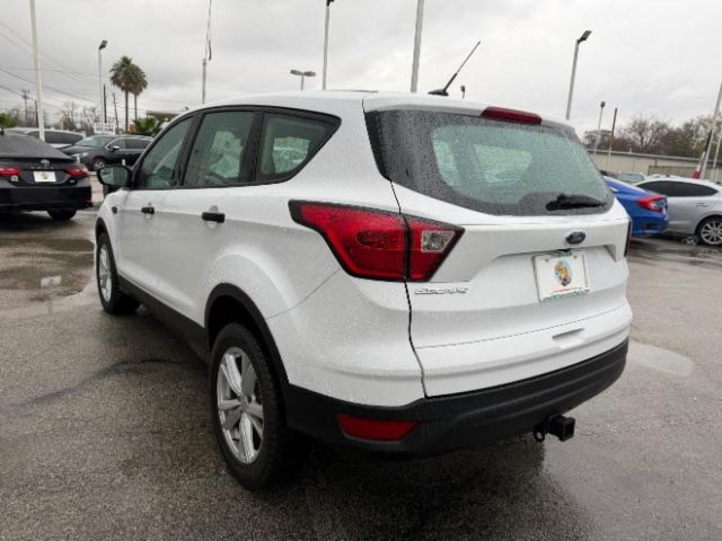 2019 Oxford White /Chromite Gray/Charcoal Black Ford Escape S (1FMCU0F70KU) with an Duratec 2.5L I-4 DOHC engine, located at 4545 Spencer Hwy., Pasadena, 77504, (832) 266-1645, 29.666037, -95.173775 - Photo#5