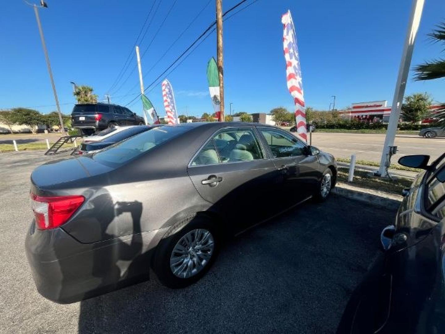 2012 Magnetic Gray Metall /Ash Toyota Camry LE (4T4BF1FK1CR) with an 2.5L I-4 DOHC engine, located at 4545 Spencer Hwy., Pasadena, 77504, (832) 266-1645, 29.666037, -95.173775- Photo#6