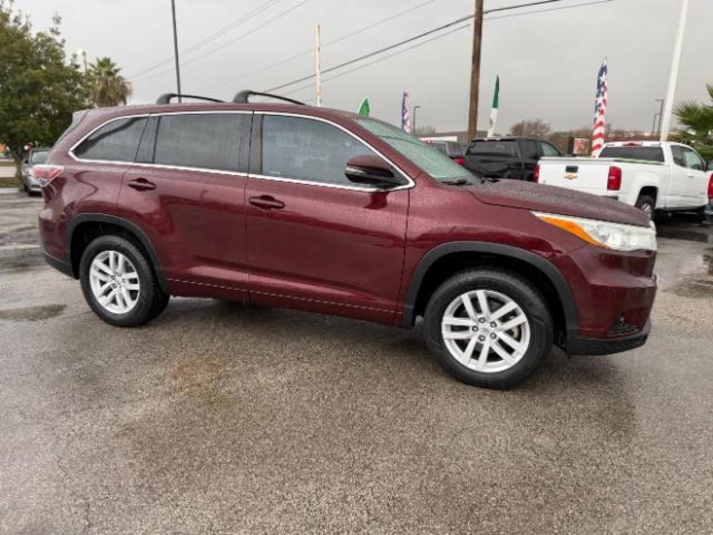 2015 Ooh La La Rouge Mica /Black Toyota Highlander LE (5TDZARFH9FS) with an 2.7L I-4 DOHC engine, located at 4545 Spencer Hwy., Pasadena, 77504, (832) 266-1645, 29.666037, -95.173775 - Photo#2