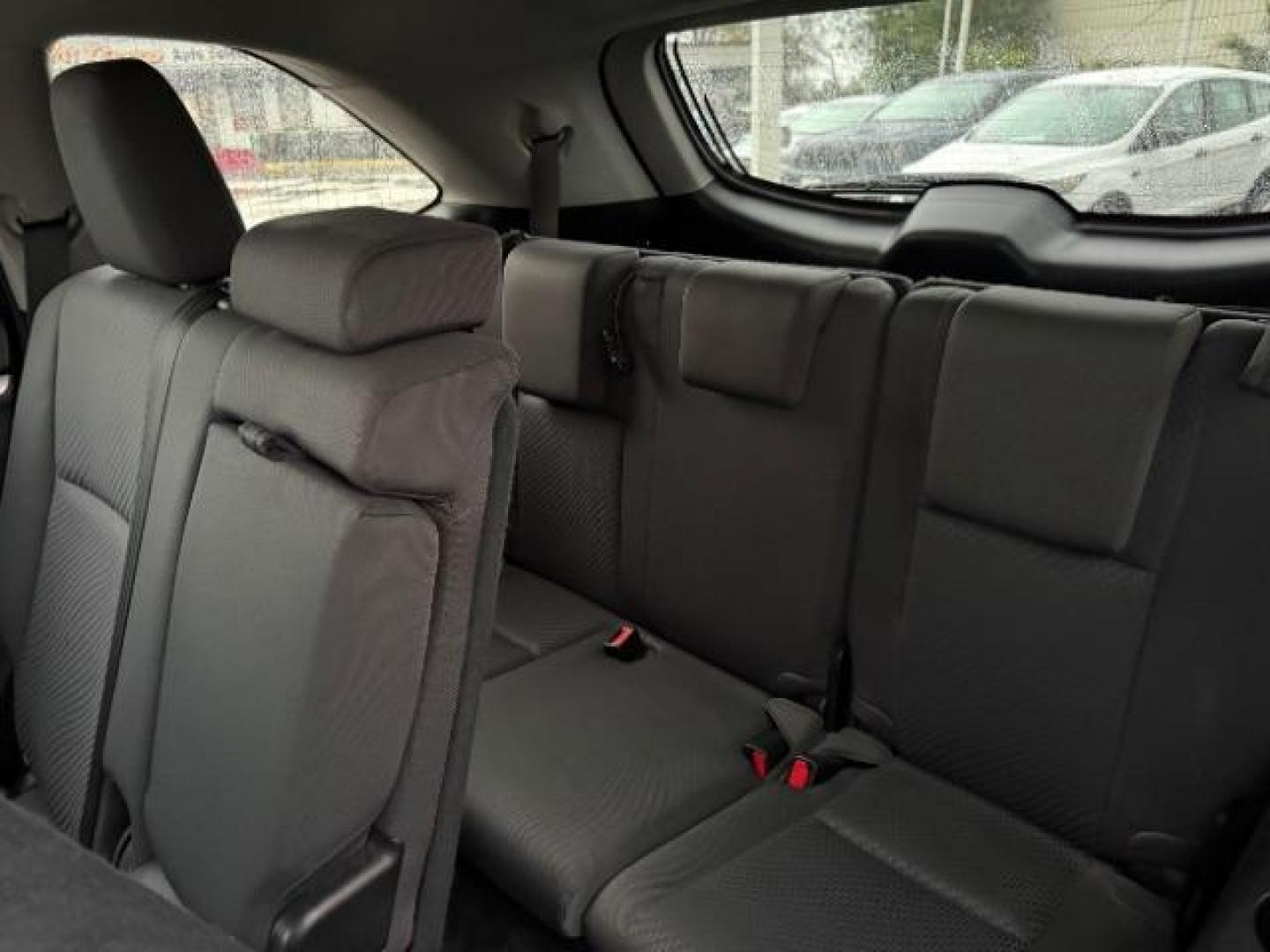 2015 Ooh La La Rouge Mica /Black Toyota Highlander LE (5TDZARFH9FS) with an 2.7L I-4 DOHC engine, located at 4545 Spencer Hwy., Pasadena, 77504, (832) 266-1645, 29.666037, -95.173775 - Photo#11