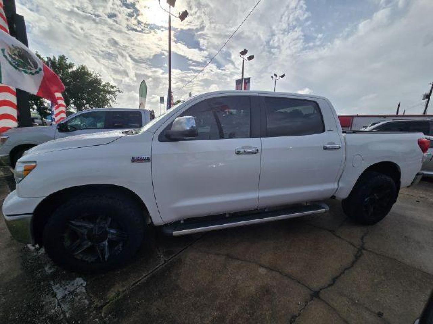 2010 Super White Toyota Tundra Grade 5.7L V8 (5TFEY5F17AX) with an I-FORCE 5.7L V-8 DOHC engine, located at 7935 Gulf Freeway, Houston, 77017, (832) 266-1645, 29.684393, -95.275665 - Photo#2