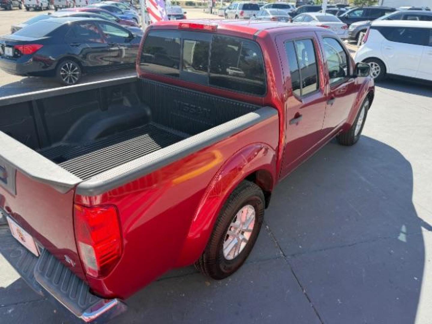 2019 Cayenne Red Metallic /Steel, cloth Nissan Frontier S Crew Cab 5AT 2WD (1N6AD0ER5KN) with an 4.0L V6 DOHC 24V engine, 5-Speed Automatic transmission, located at 4545 Spencer Hwy., Pasadena, 77504, (832) 266-1645, 29.666037, -95.173775 - Photo#4