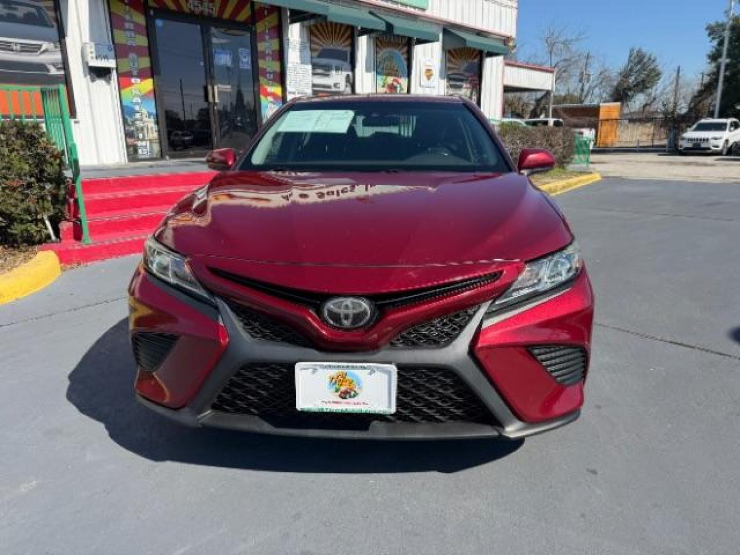 2018 Ruby Flare Pearl /Black Toyota Camry LE | SE | XLE | L (4T1B11HK7JU) with an 2.5L I-4 port/direct injection engine, located at 4545 Spencer Hwy., Pasadena, 77504, (832) 266-1645, 29.666037, -95.173775 - Photo#1