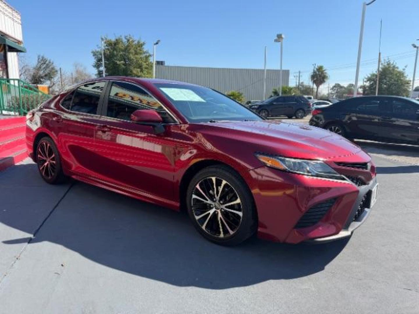 2018 Ruby Flare Pearl /Black Toyota Camry LE | SE | XLE | L (4T1B11HK7JU) with an 2.5L I-4 port/direct injection engine, located at 4545 Spencer Hwy., Pasadena, 77504, (832) 266-1645, 29.666037, -95.173775 - Photo#2