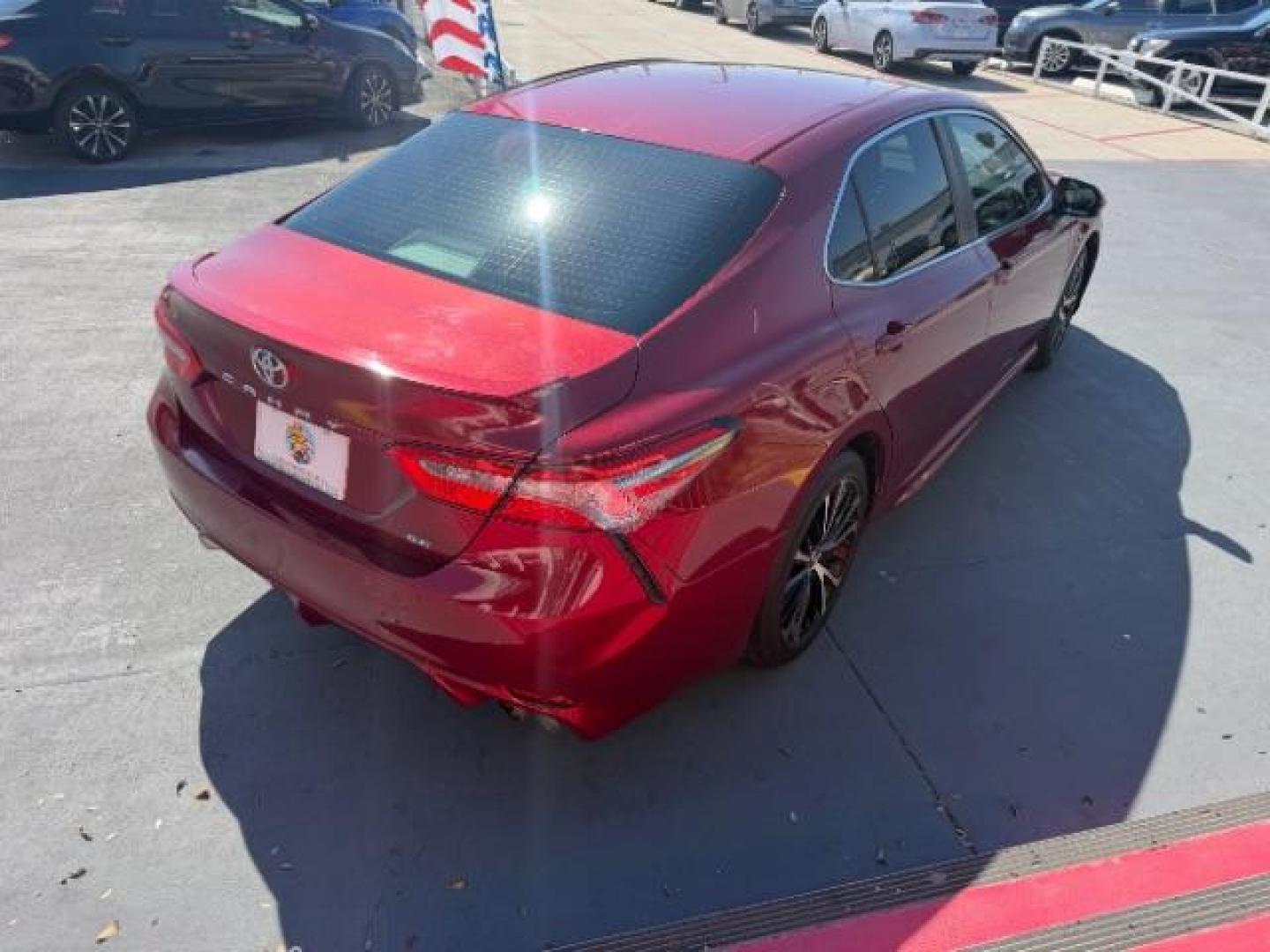 2018 Ruby Flare Pearl /Black Toyota Camry LE | SE | XLE | L (4T1B11HK7JU) with an 2.5L I-4 port/direct injection engine, located at 4545 Spencer Hwy., Pasadena, 77504, (832) 266-1645, 29.666037, -95.173775 - Photo#4