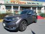 2019 Dark Olive Metallic /Gray Honda CR-V EX (5J6RW2H58KL) with an 1.5L I-4 gasoline direct injection engine, located at 4545 Spencer Hwy., Pasadena, 77504, (832) 266-1645, 29.666037, -95.173775 - Photo#5