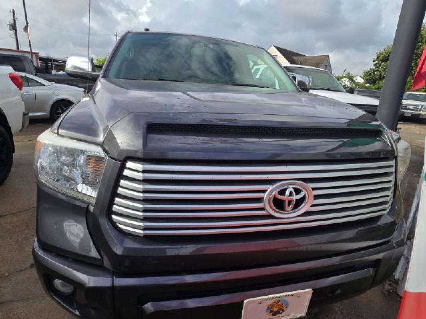 2016 Magnetic Gray Metallic Toyota Tundra Platinum 5.7L V8 (5TFAW5F14GX) with an I-FORCE 5.7L V-8 DOHC engine, 6-Speed Automatic transmission, located at 4545 Spencer Hwy., Pasadena, 77504, (832) 266-1645, 29.666037, -95.173775 - Photo#2