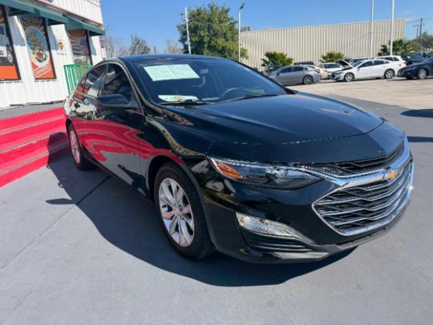 2020 Mosaic Black Metallic /Jet Black Chevrolet Malibu FWD LT (1G1ZD5ST3LF) with an ECOTEC 1.5L I-4 gasoline direct injection engine, located at 4545 Spencer Hwy., Pasadena, 77504, (832) 266-1645, 29.666037, -95.173775 - Photo#2
