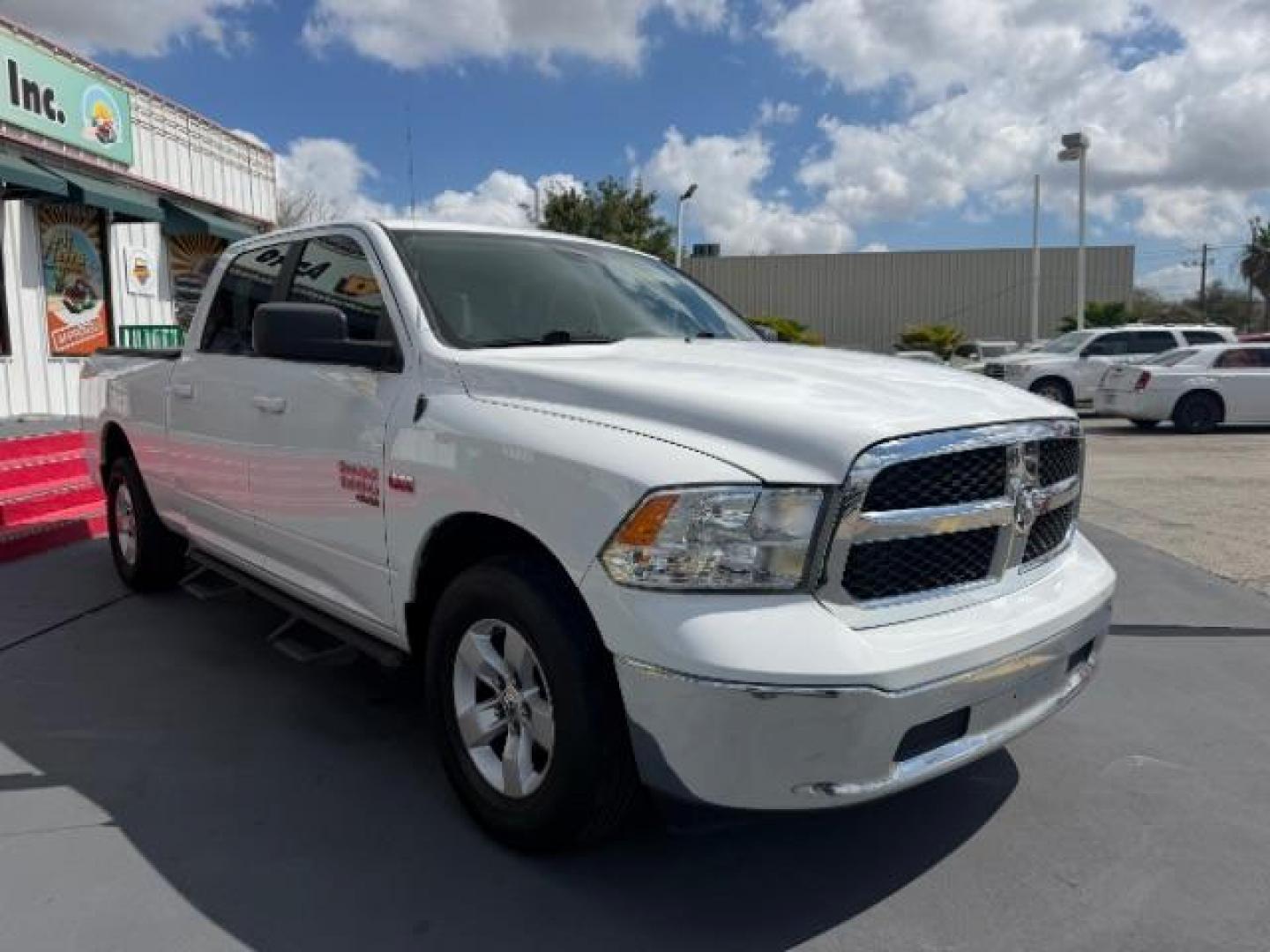 2020 Bright White Clearcoat Ram 1500 Classic SLT Crew Cab 4x2 6'4 Box (1C6RR6TT8LS) with an HEMI 5.7L V-8 variable valve control engine, located at 4545 Spencer Hwy., Pasadena, 77504, (832) 266-1645, 29.666037, -95.173775 - Photo#2