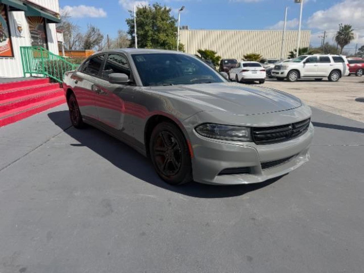2019 Destroyer Gray Clearcoat Dodge Charger SXT RWD (2C3CDXBG6KH) with an Pentastar 3.6L V-6 DOHC engine, located at 4545 Spencer Hwy., Pasadena, 77504, (832) 266-1645, 29.666037, -95.173775 - Photo#2