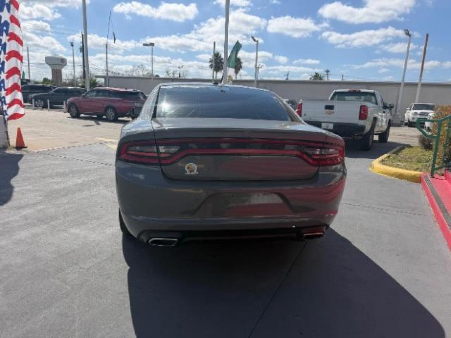 2019 Destroyer Gray Clearcoat Dodge Charger SXT RWD (2C3CDXBG6KH) with an Pentastar 3.6L V-6 DOHC engine, located at 4545 Spencer Hwy., Pasadena, 77504, (832) 266-1645, 29.666037, -95.173775 - Photo#5