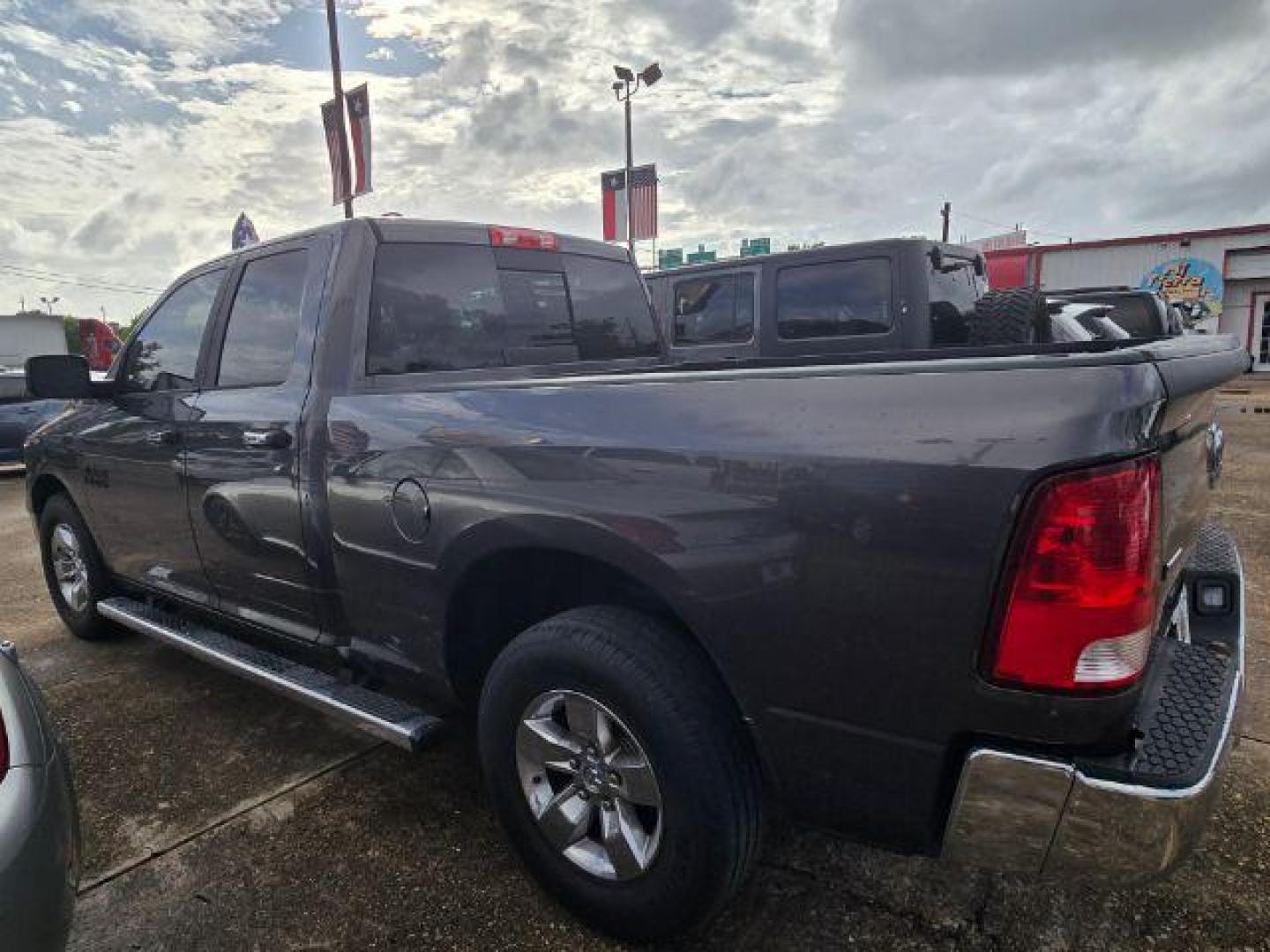 2017 Granite Crystal Metallic Clearcoat Ram 1500 SLT Quad Cab 4x2 6'4 Box (1C6RR6GG6HS) with an Pentastar 3.6L V-6 DOHC engine, located at 4545 Spencer Hwy., Pasadena, 77504, (832) 266-1645, 29.666037, -95.173775 - Photo#5